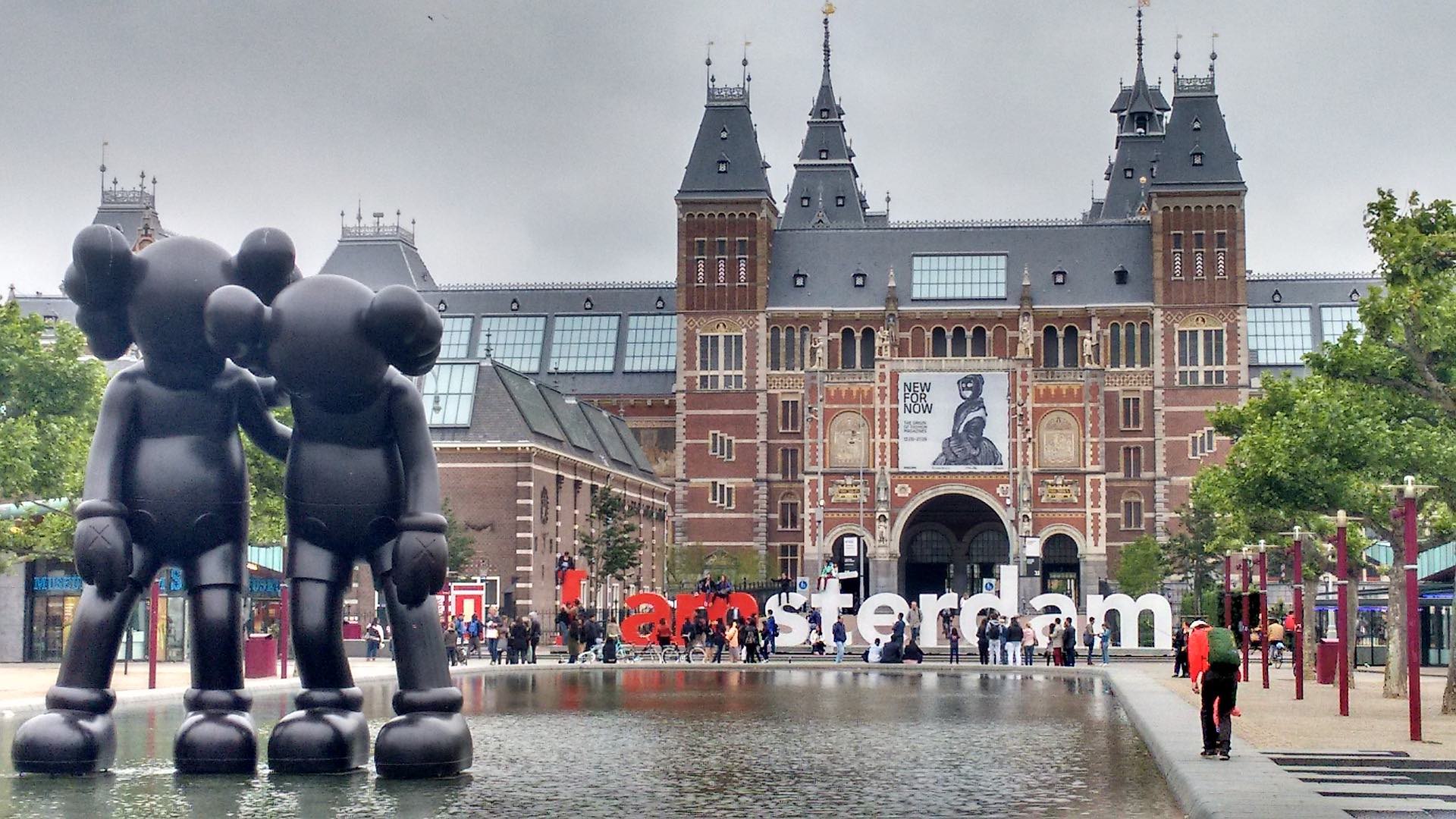 a large statue in front of Rijksmuseum