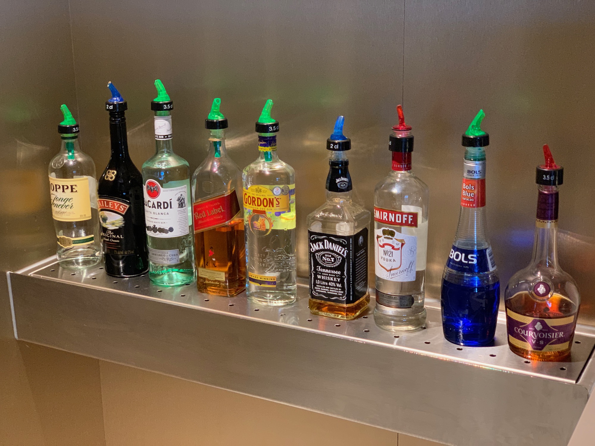 a group of bottles on a shelf