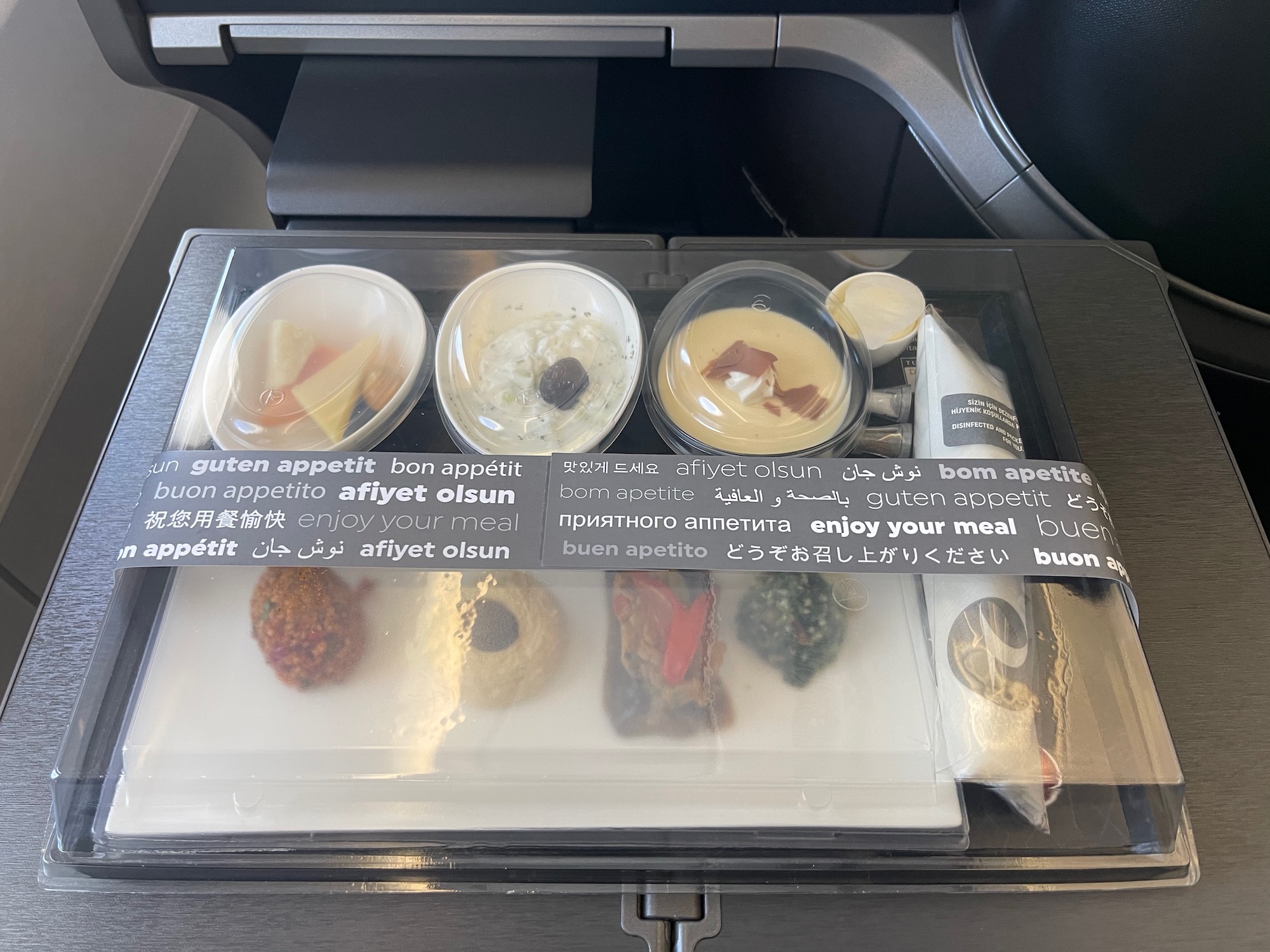 a tray of food on a plane