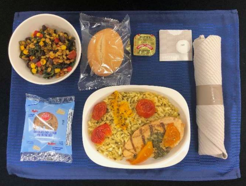 a tray with food and a napkin