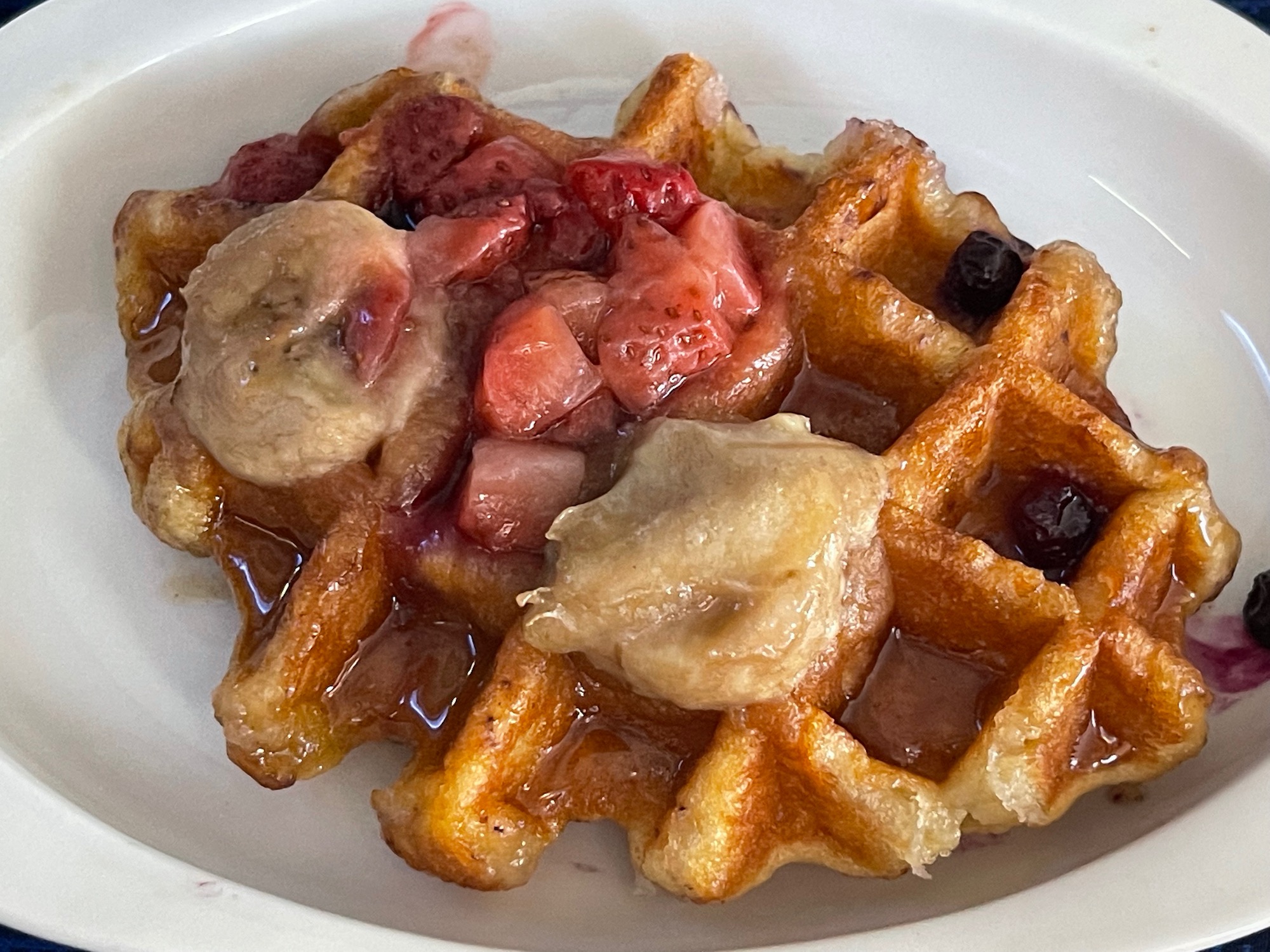 a waffle with fruit on top