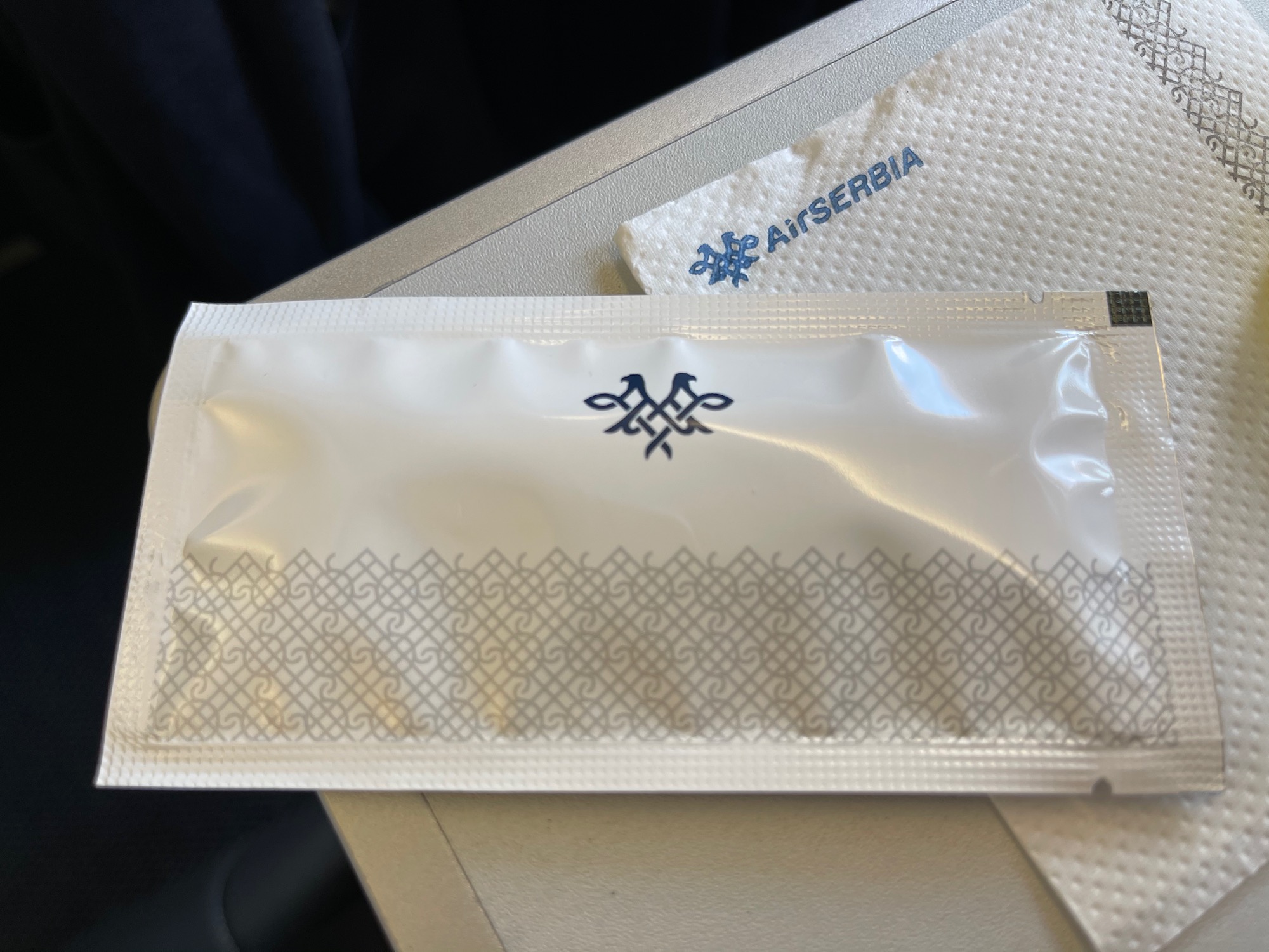 a white package with a design on it