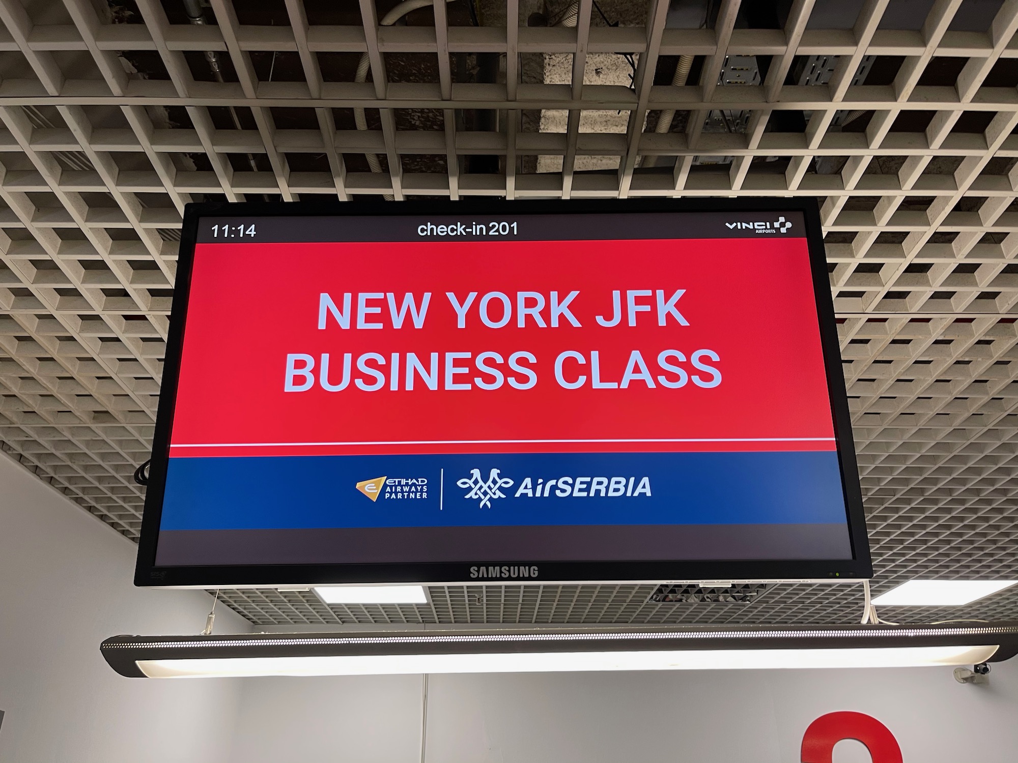 a screen with a red and blue sign