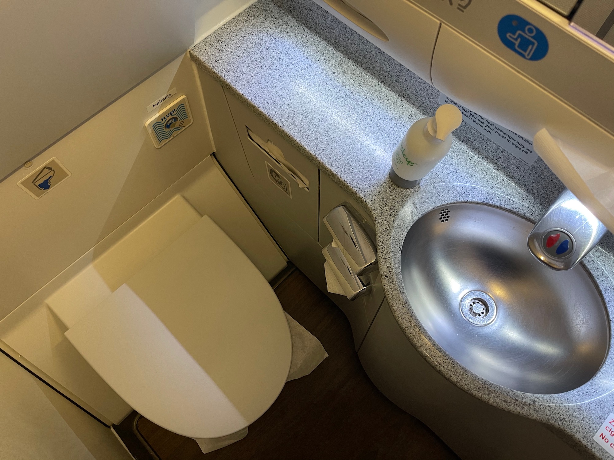 a sink and toilet in a bathroom