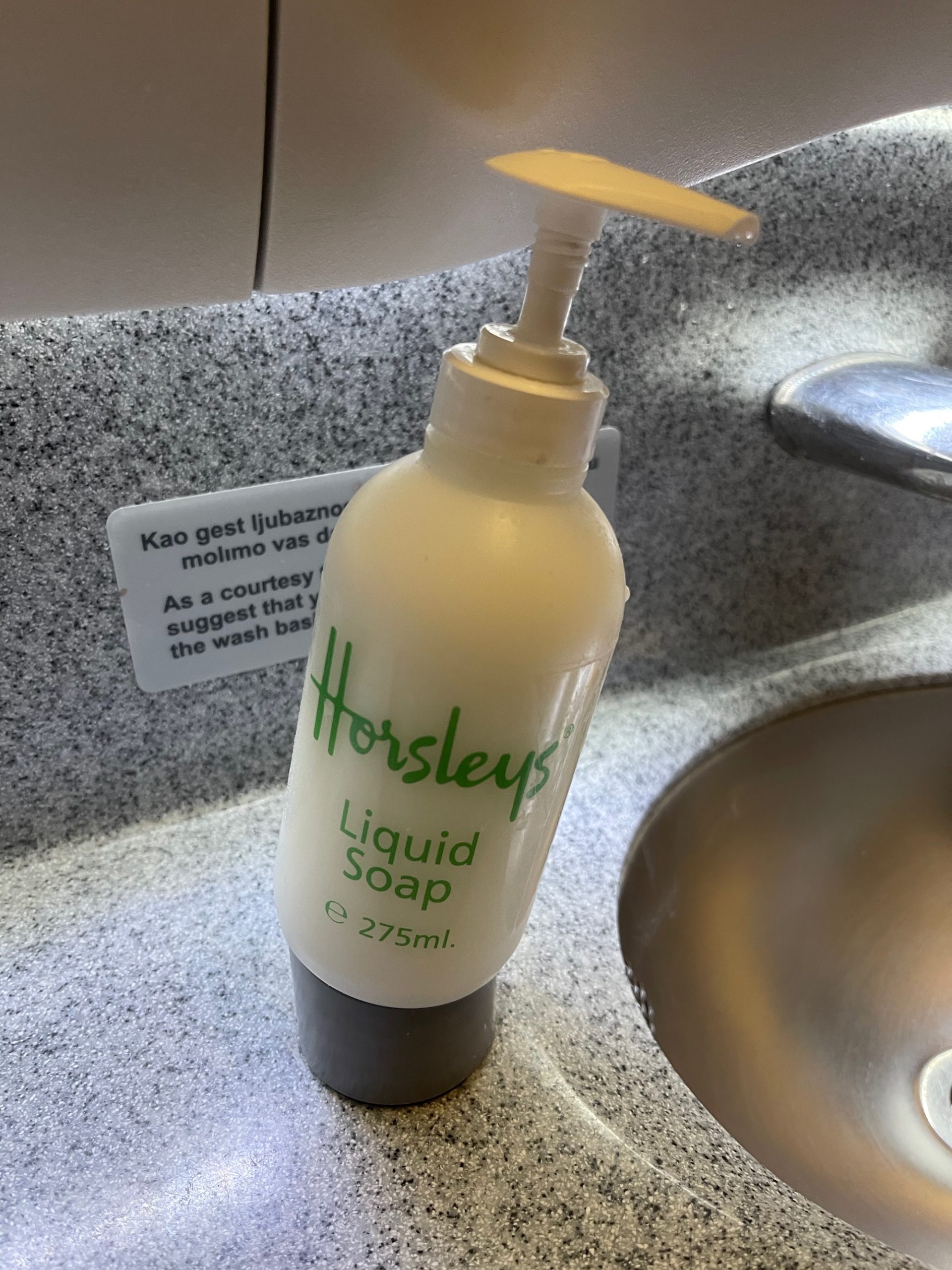 a bottle of liquid soap on a counter