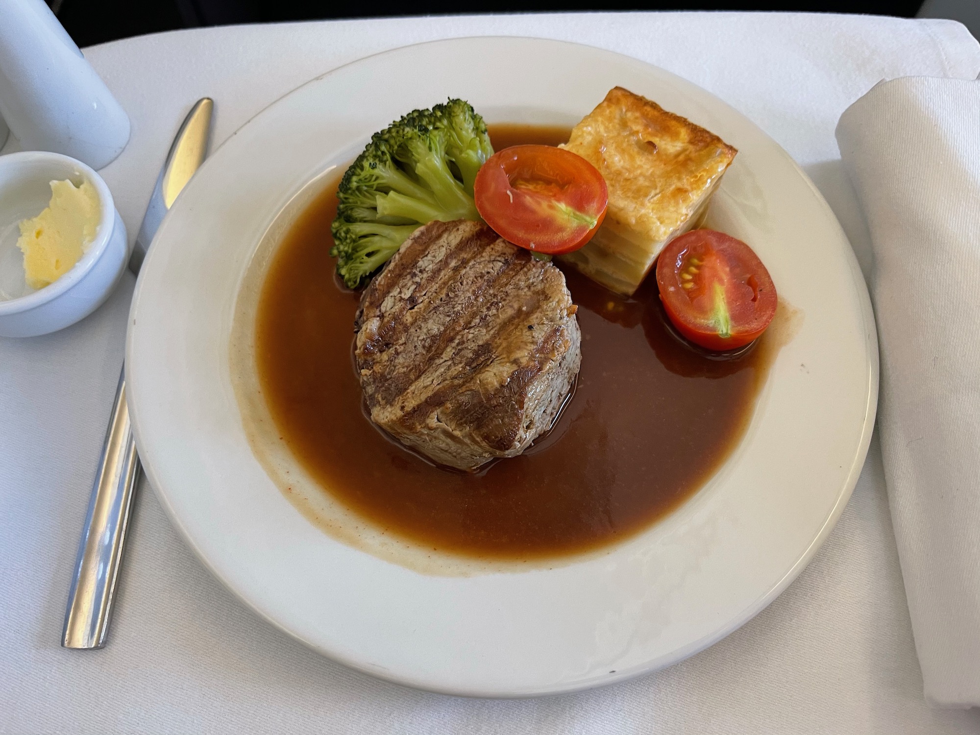 a plate of food with a fork and knife