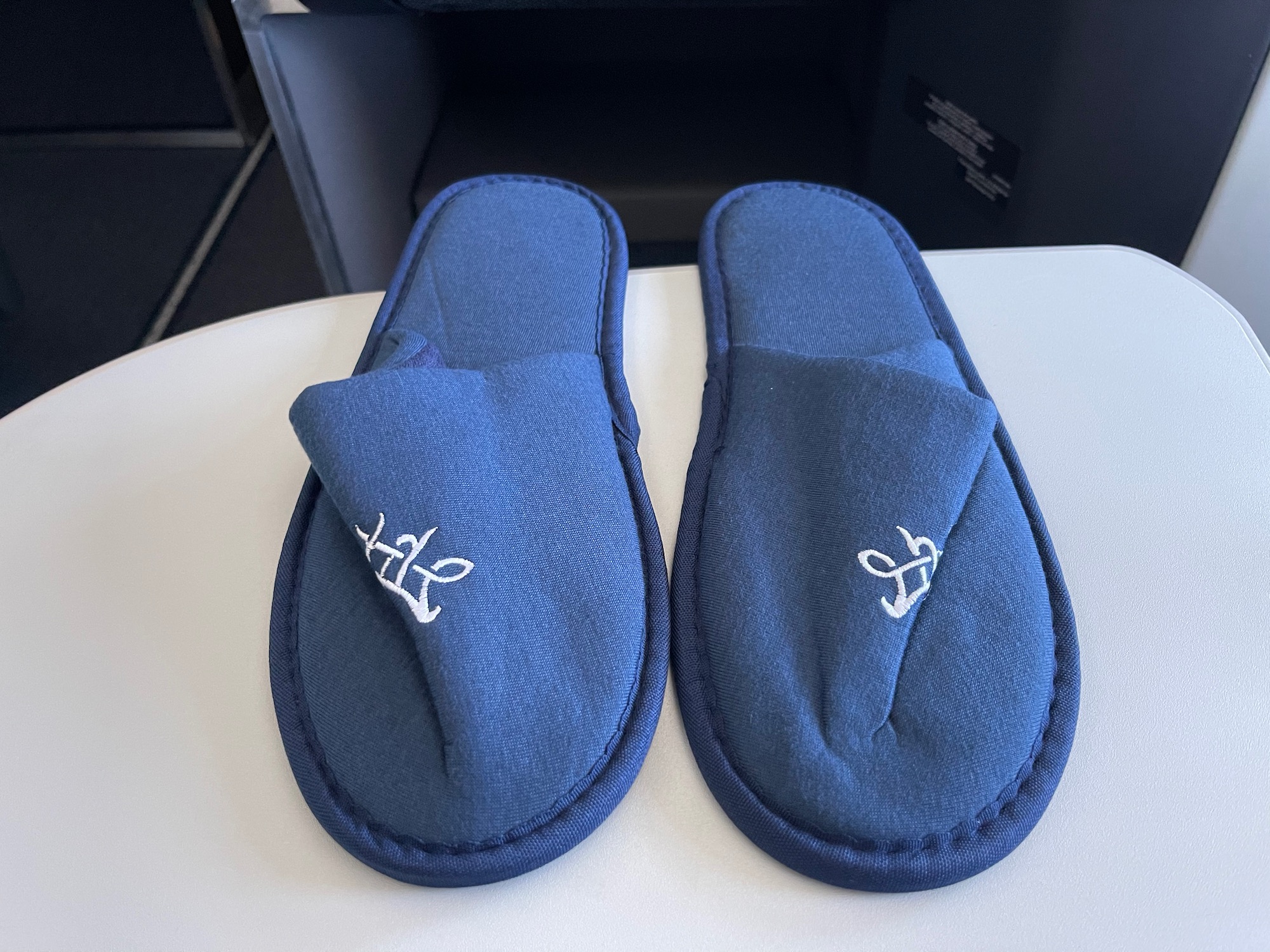 a pair of blue slippers