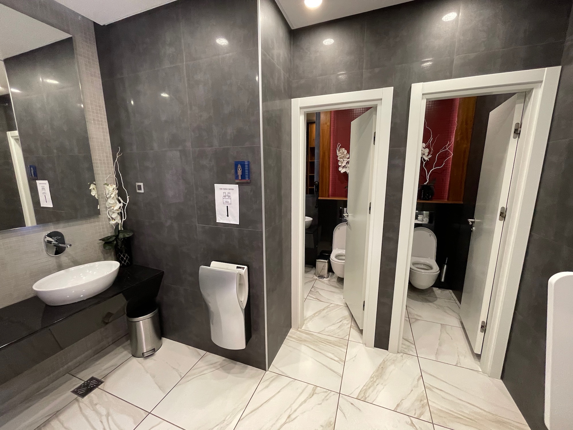 a bathroom with a sink and toilet