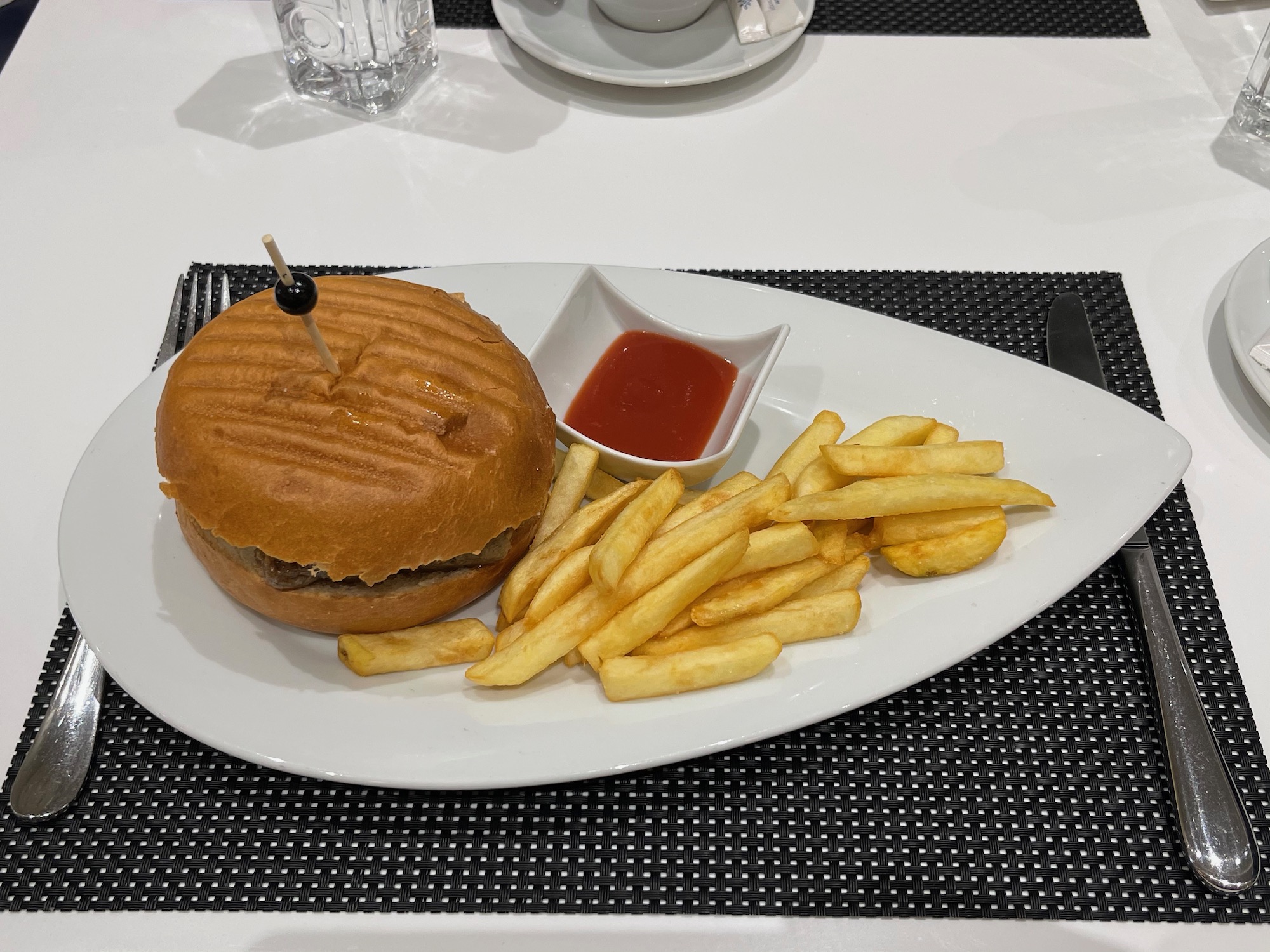 a burger and fries on a plate