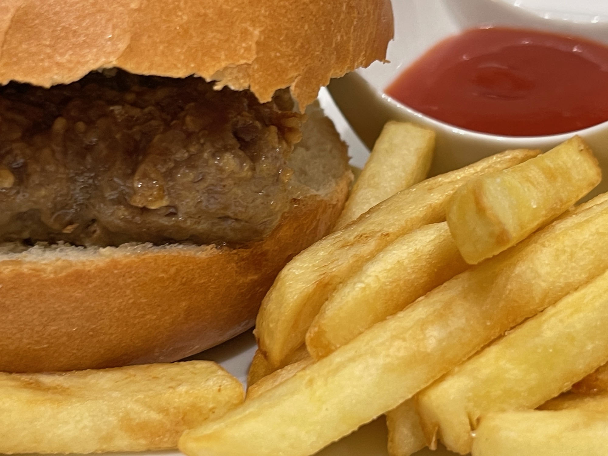 a burger and fries on a plate