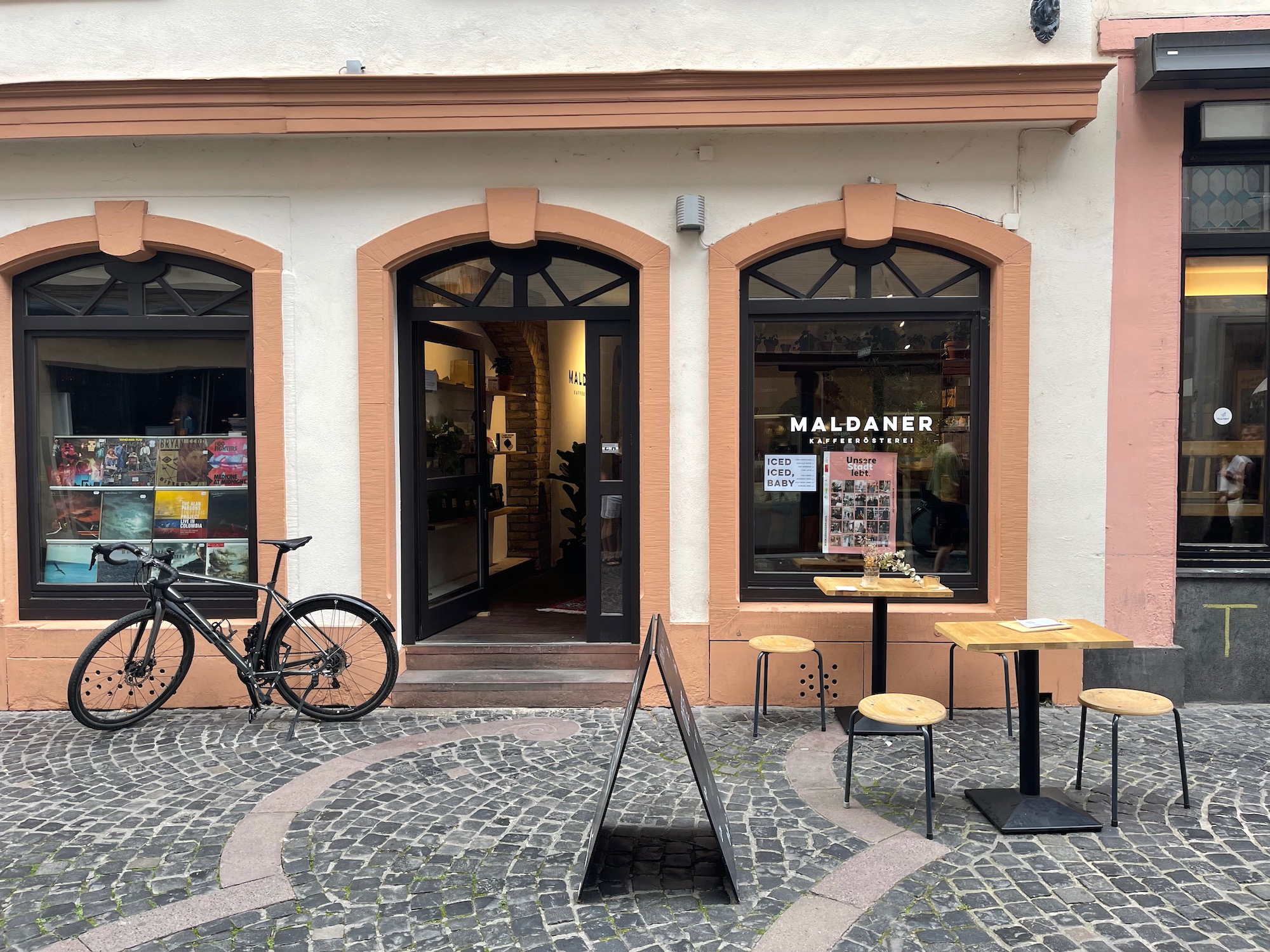 a bicycle outside a store