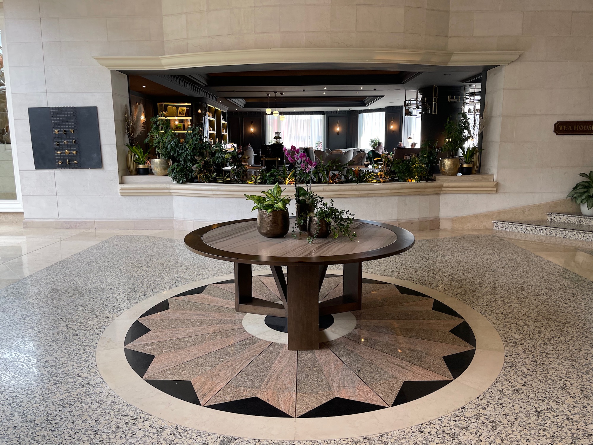 a round table with potted plants on it