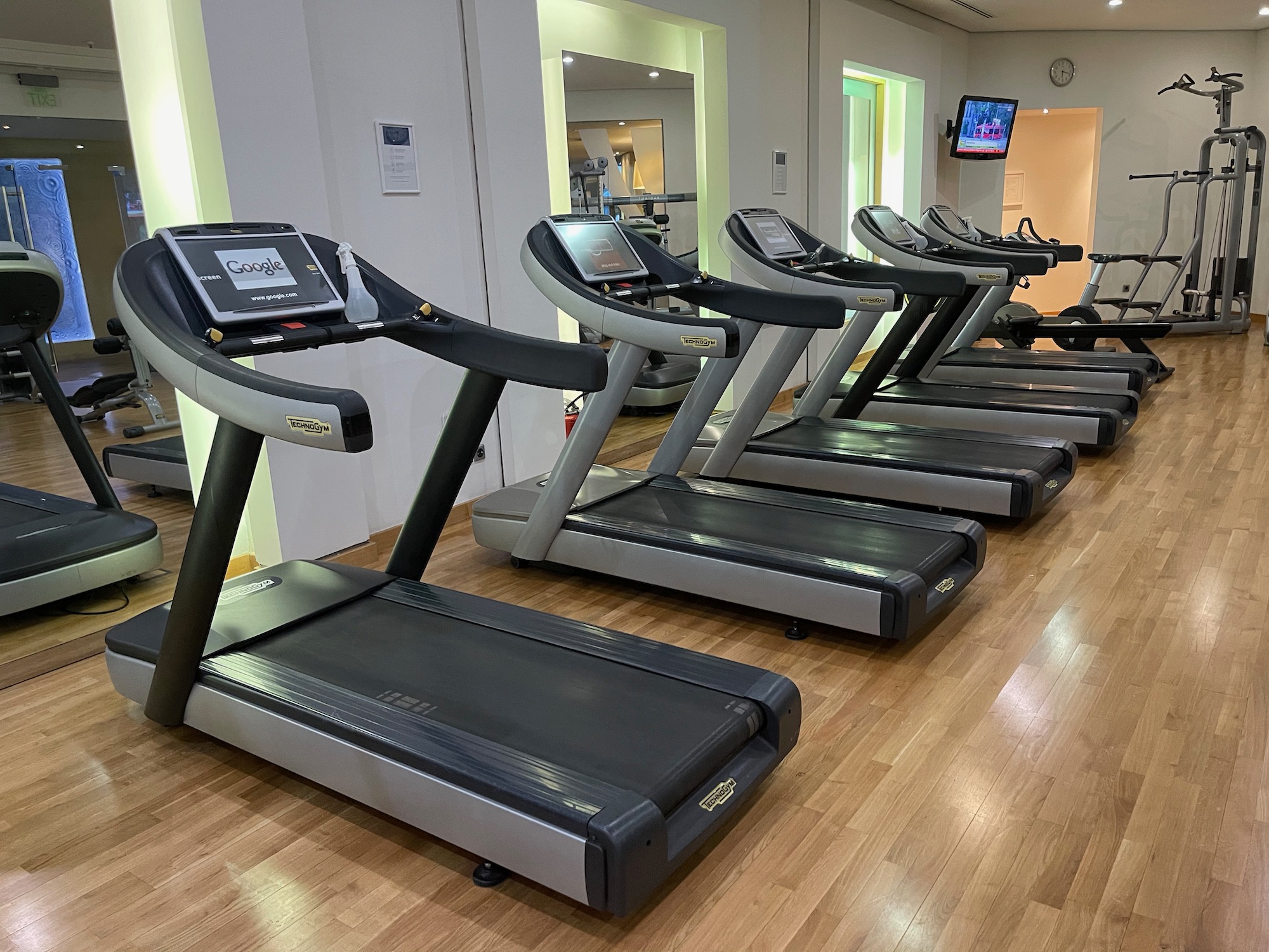 a group of treadmills in a room