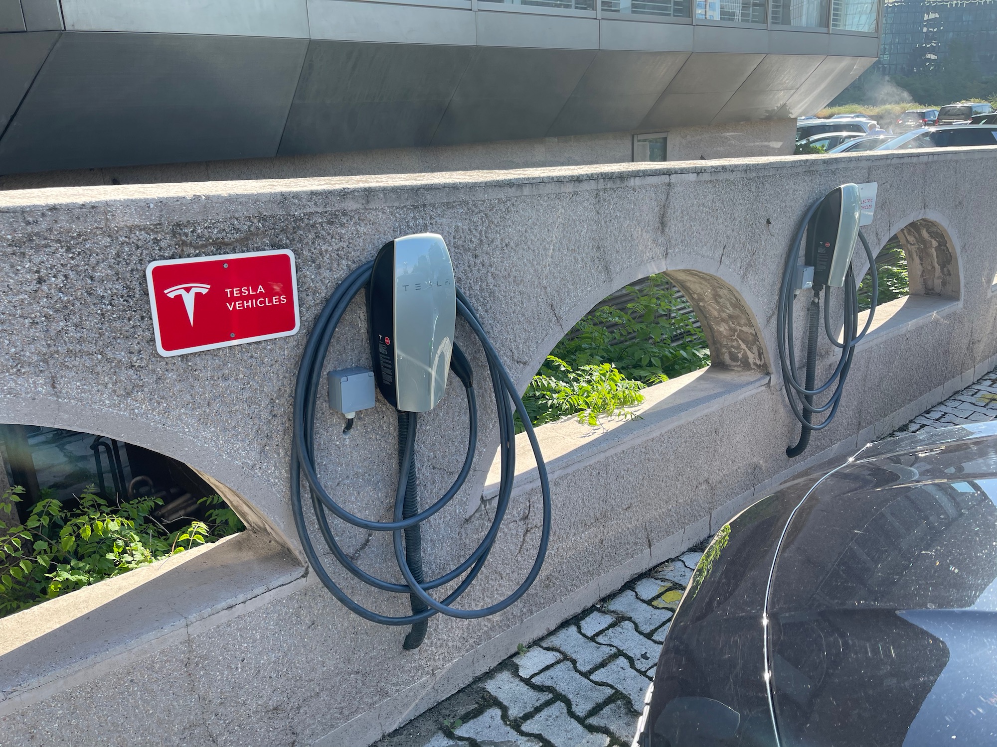 a concrete wall with wires attached to it