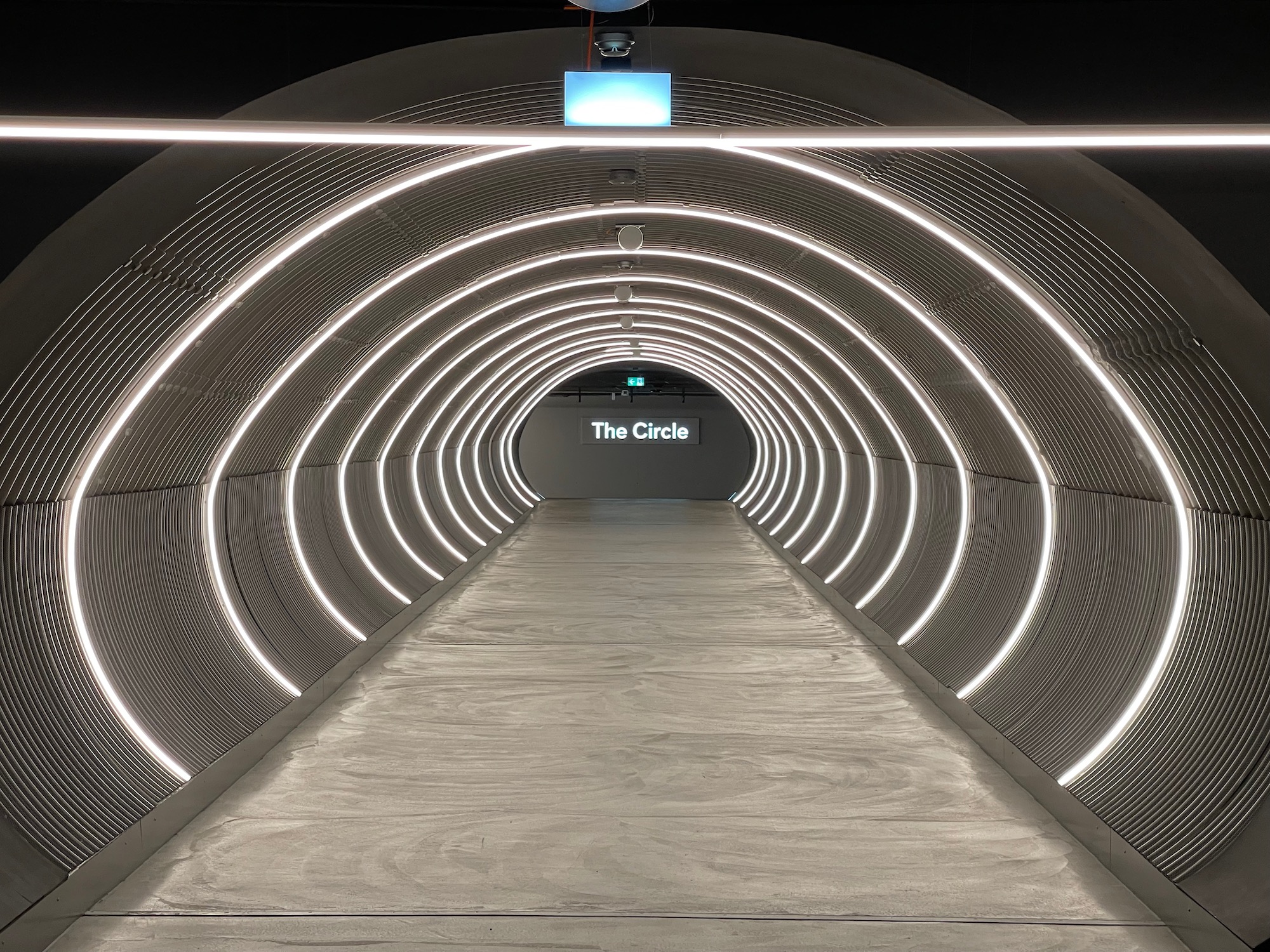 a tunnel with lights in the middle