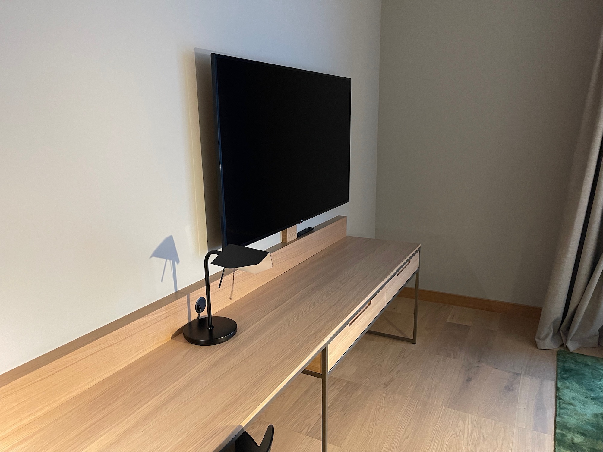 a desk with a tv on it