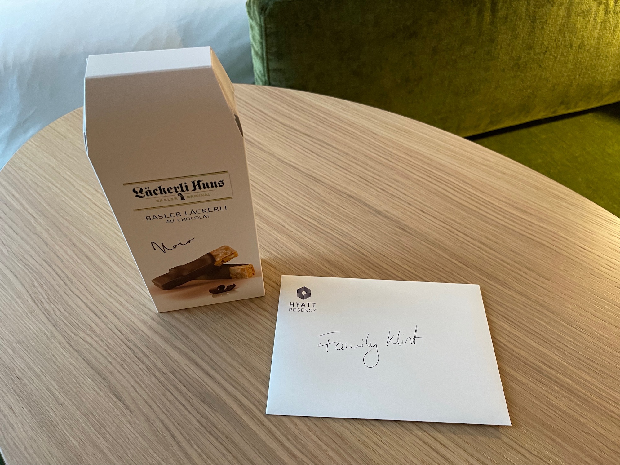 a box and envelope on a table