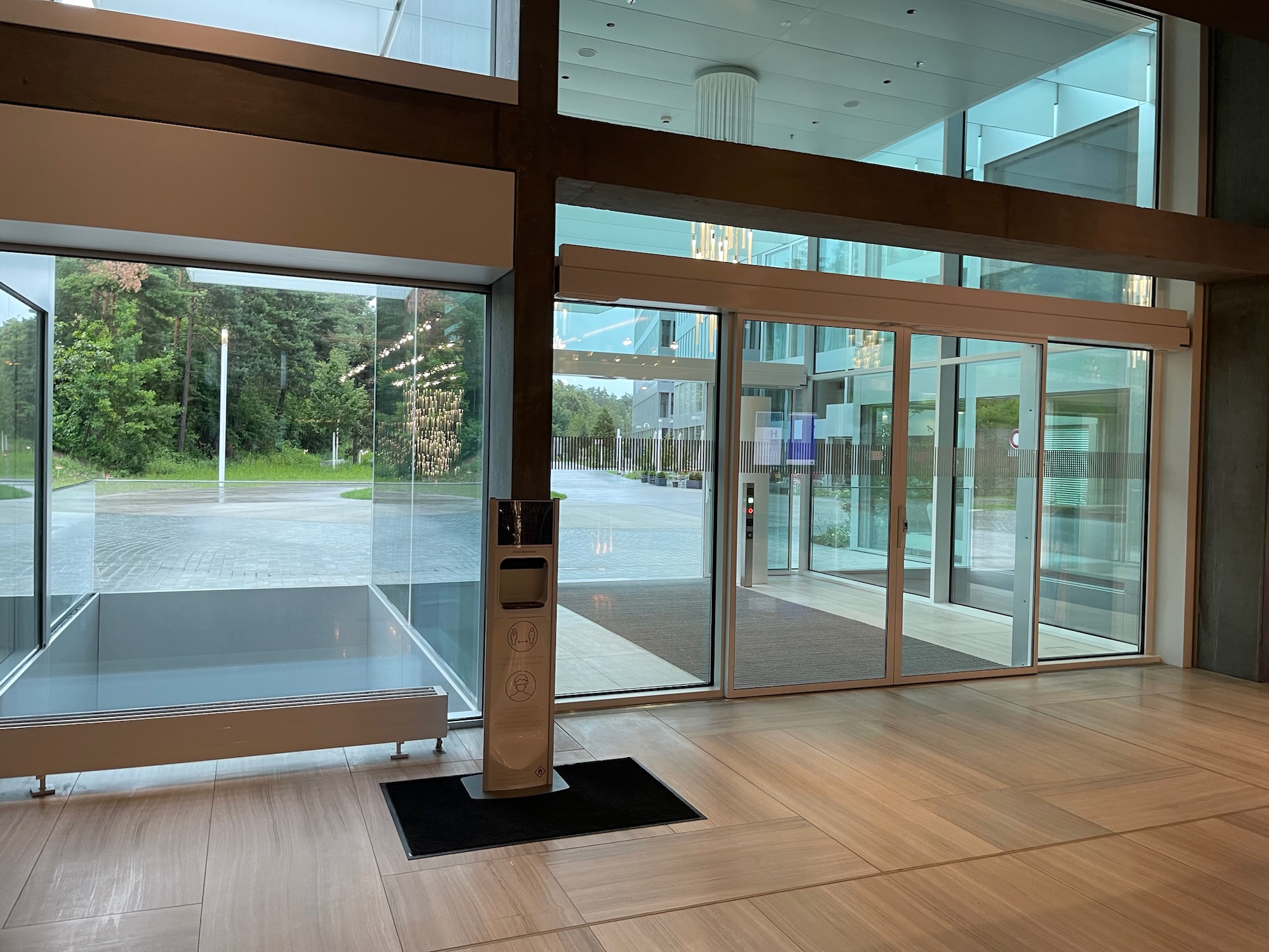 a glass wall with a door open