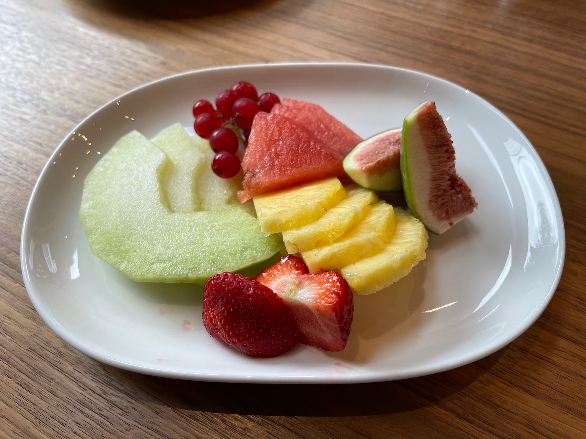 a plate of fruit on a table