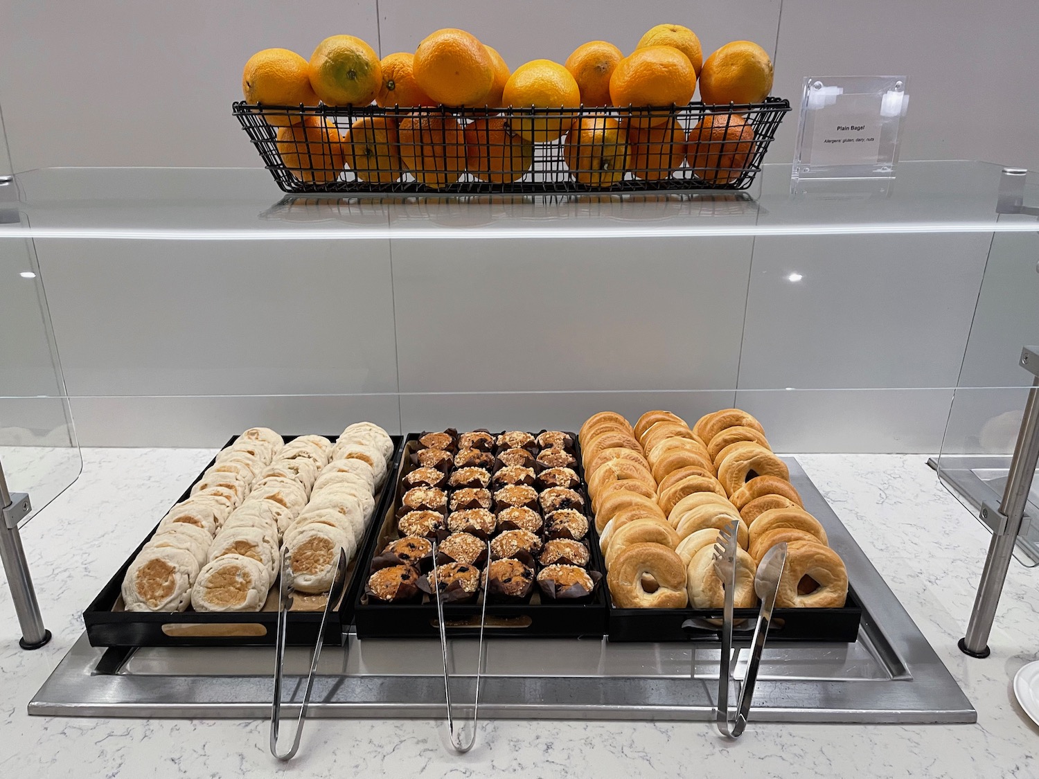 a tray of pastries and oranges