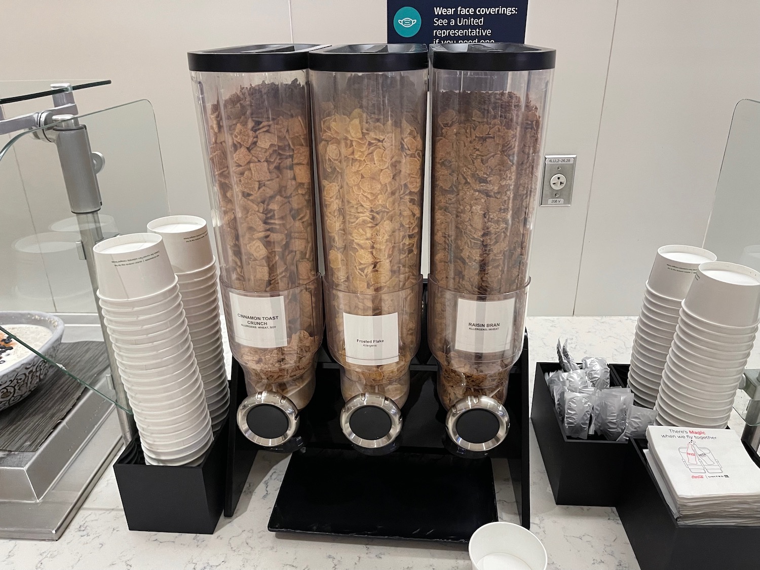 a group of cereal in a dispenser