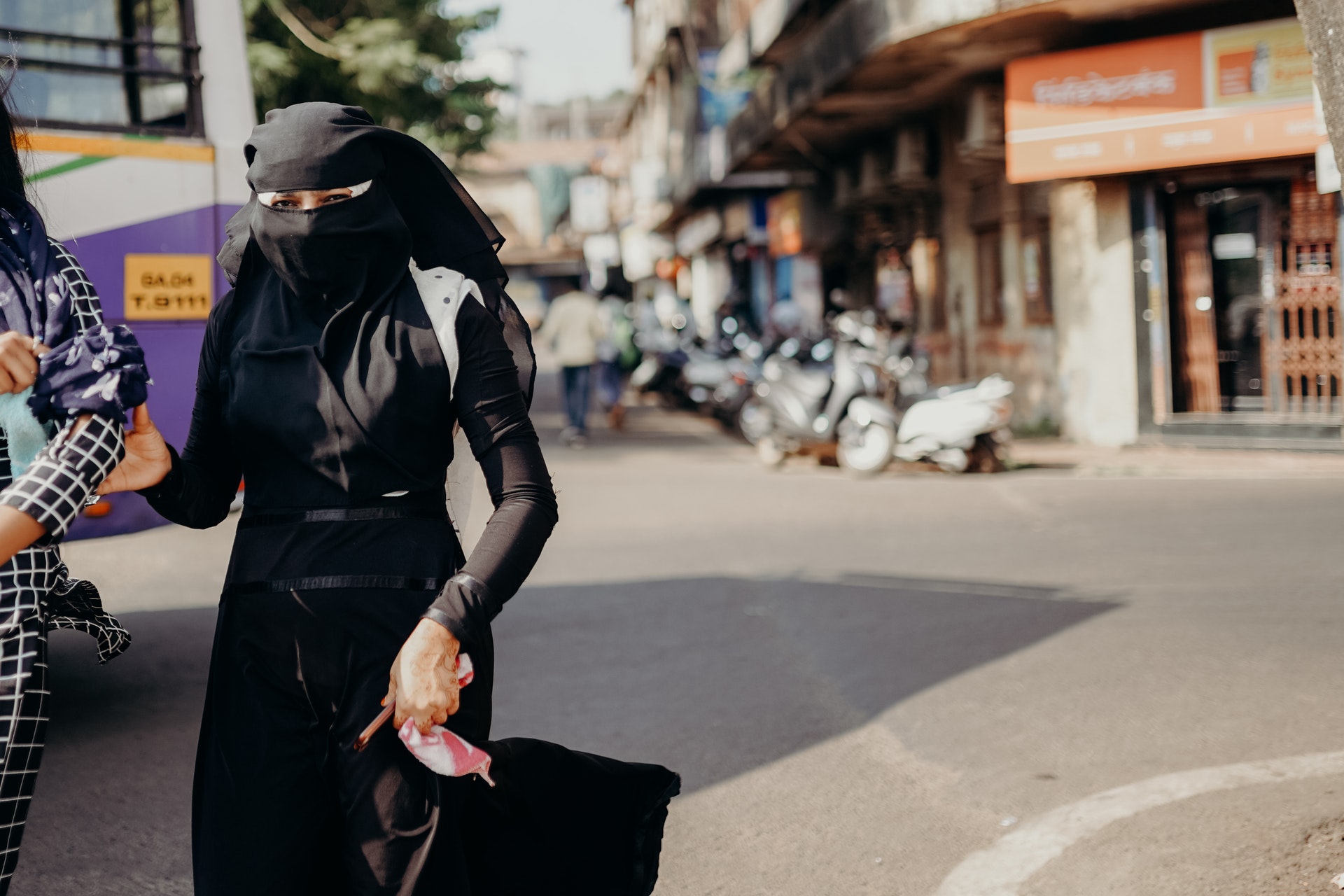 a woman wearing a black outfit