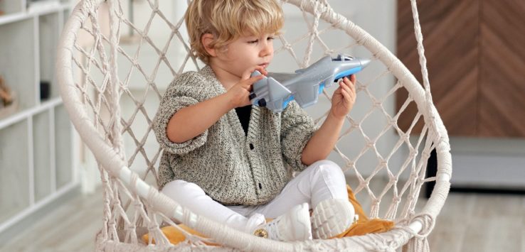 a child sitting in a chair