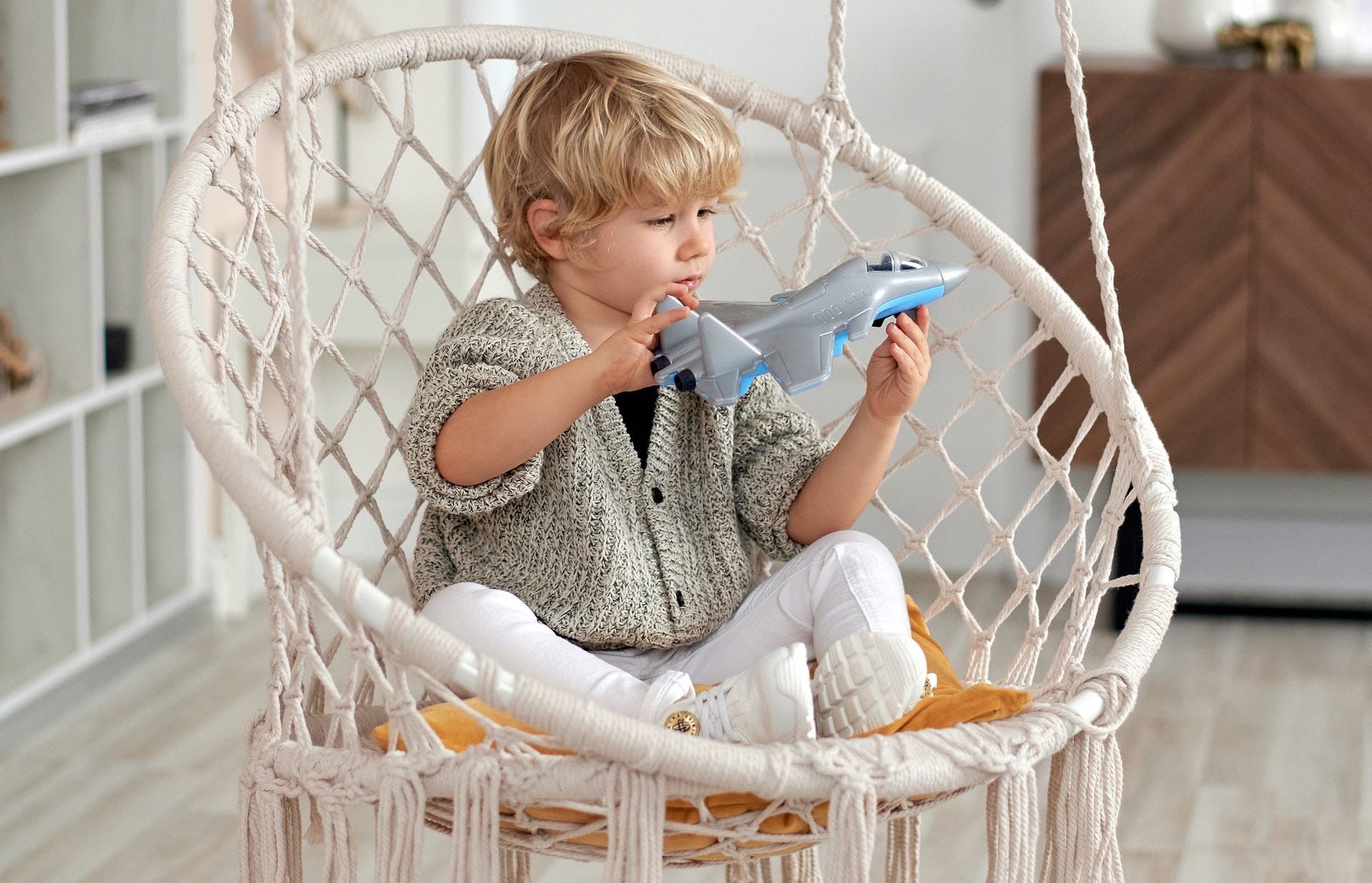 a child sitting in a chair