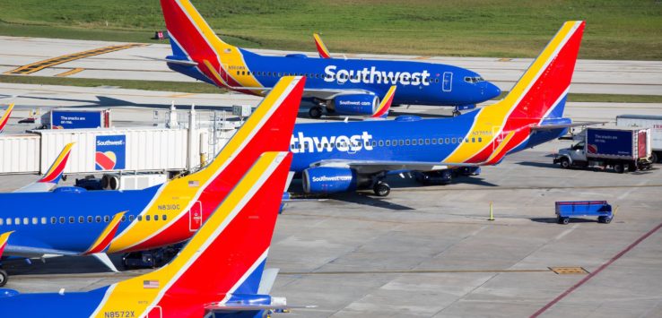 airplanes parked on a tarmac