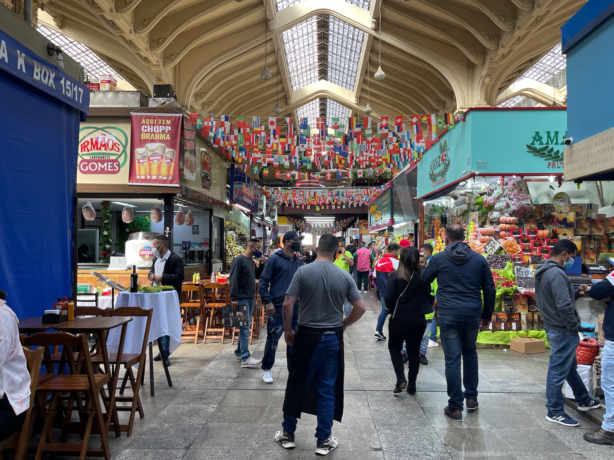 people walking inside a market