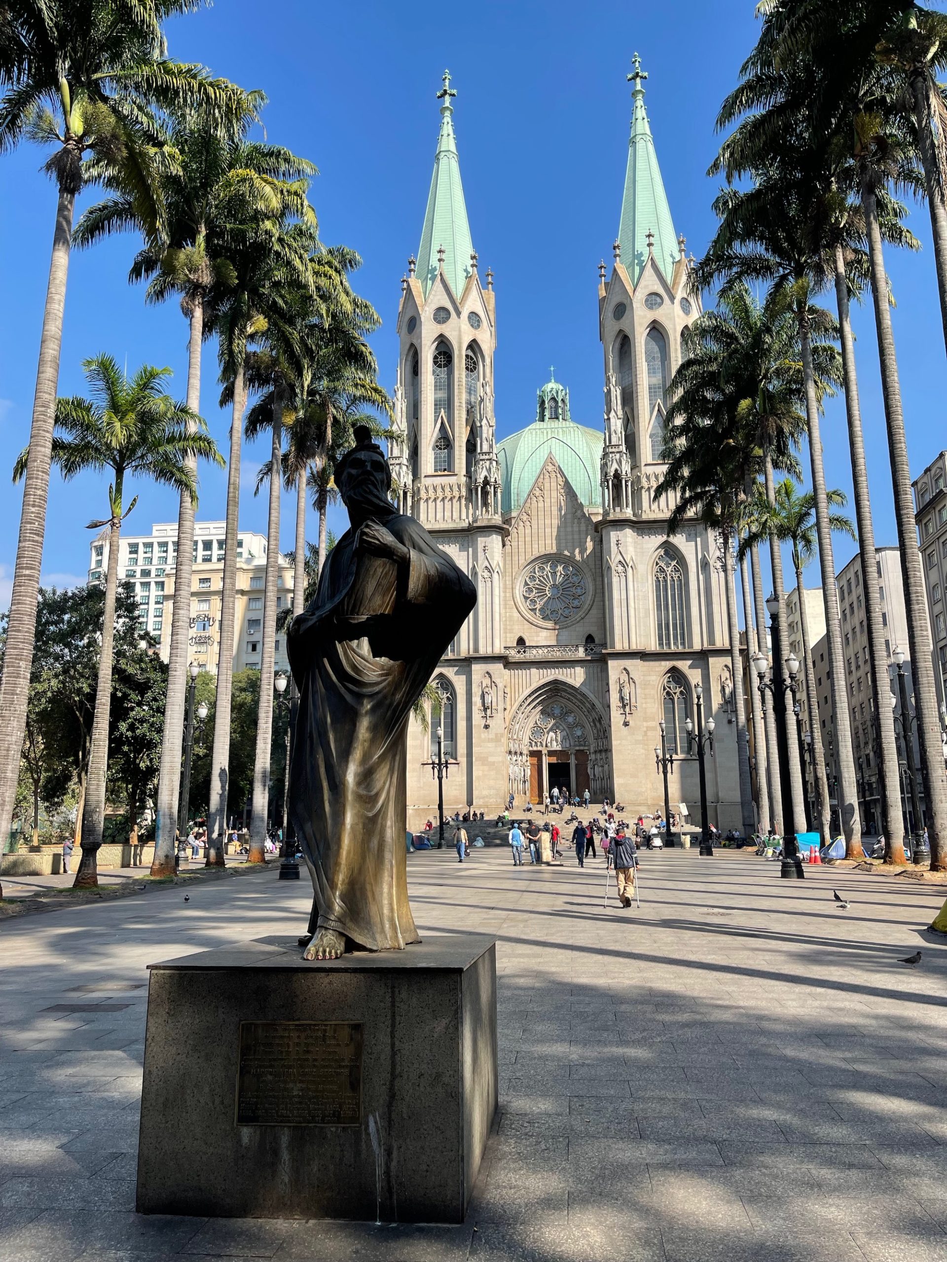 a statue in front of São Paulo Cathedral