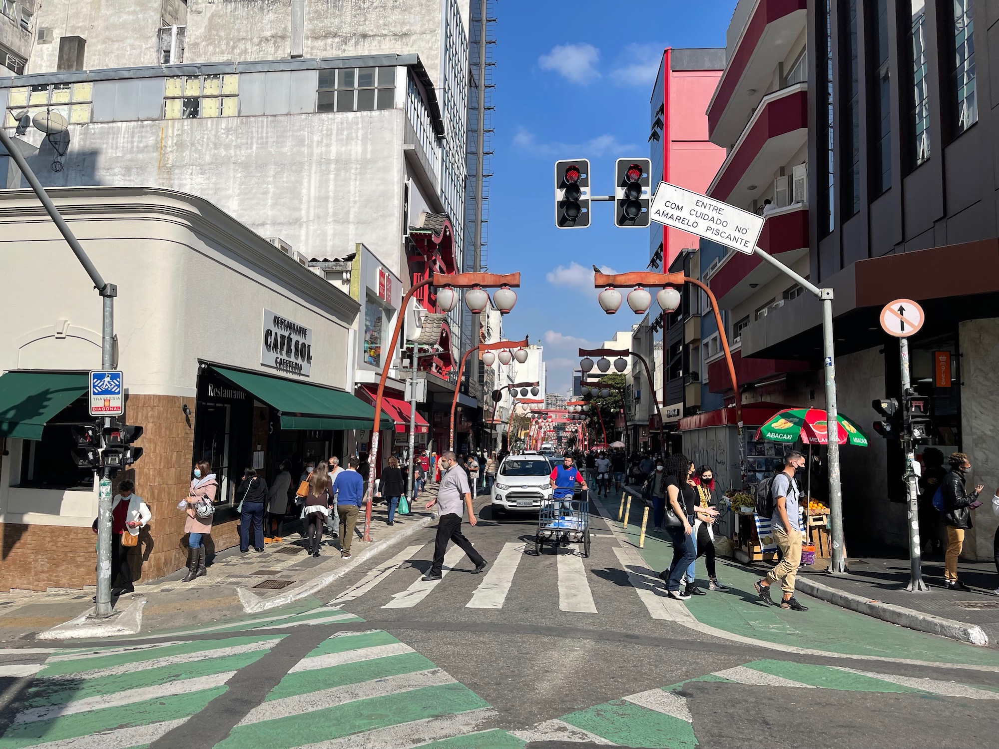 a street with people walking on it