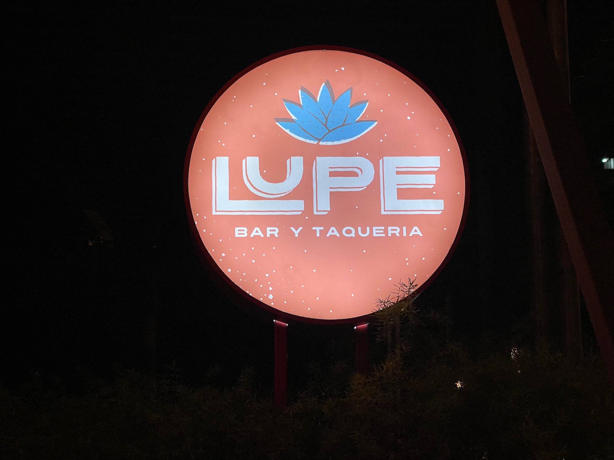 a sign outside at night