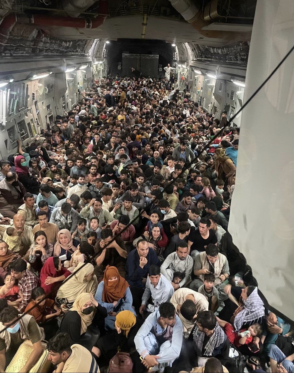 a large group of people in a tunnel