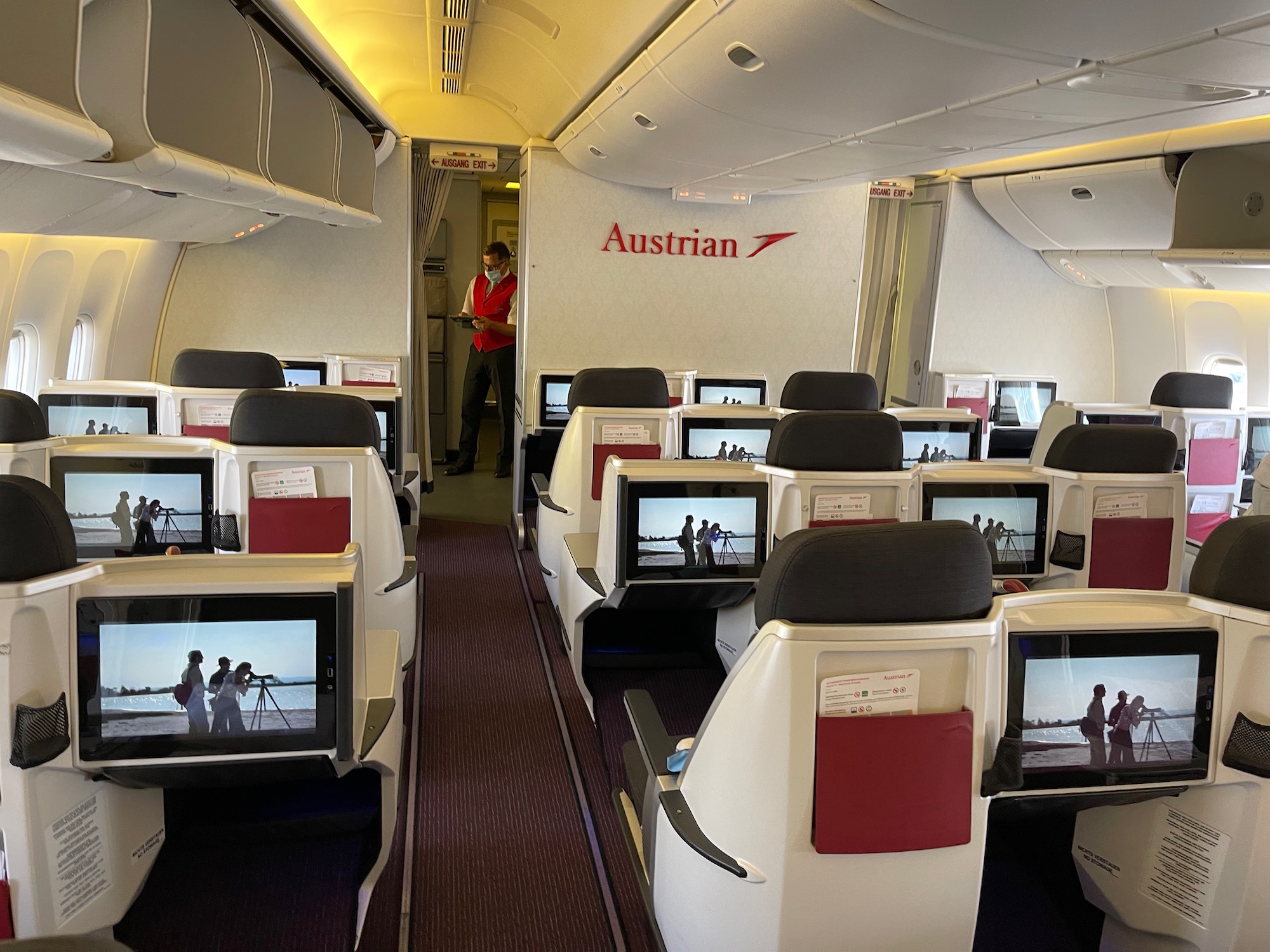 a person standing in the back of an airplane