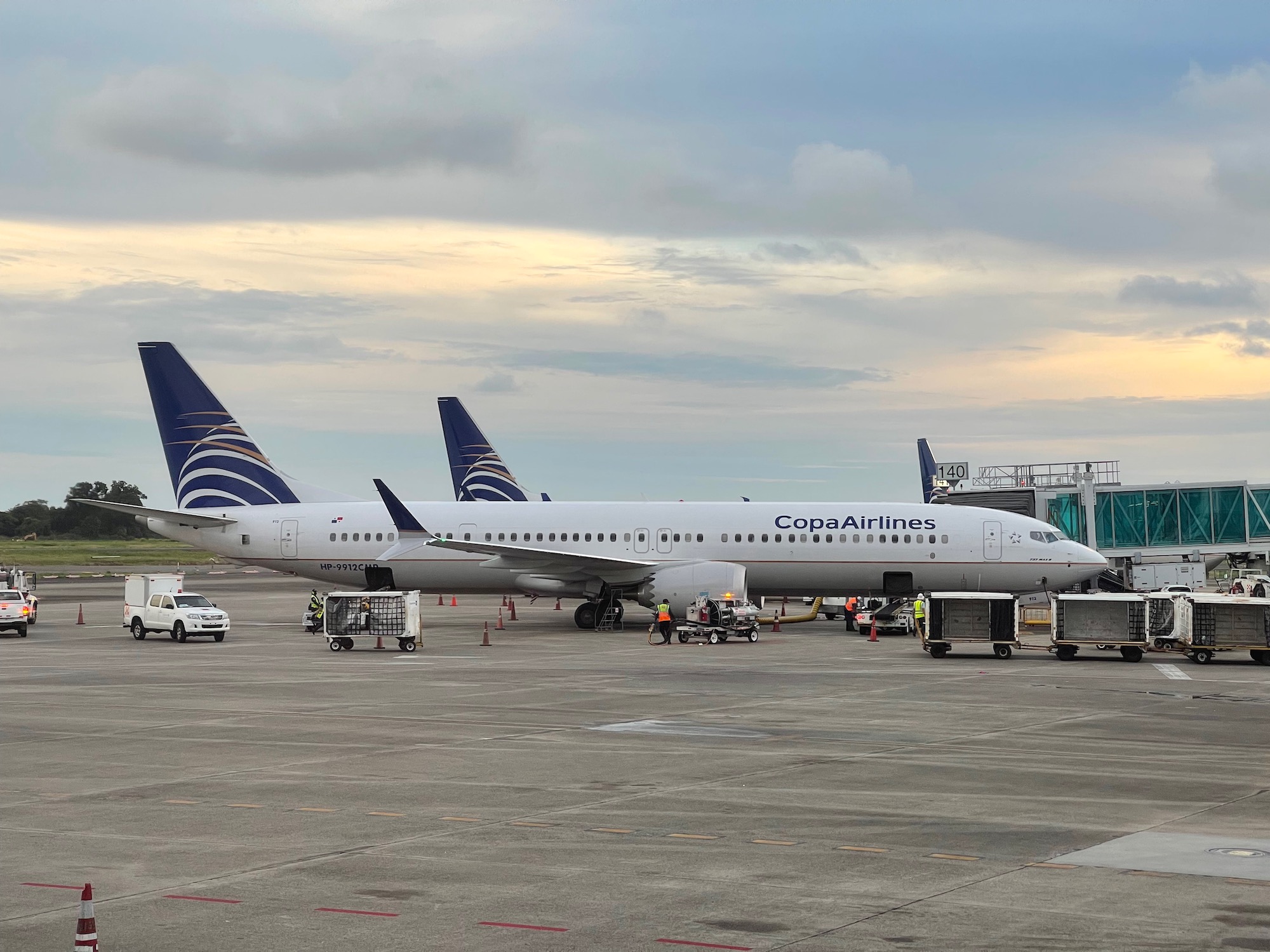 a group of airplanes parked on a tarmac