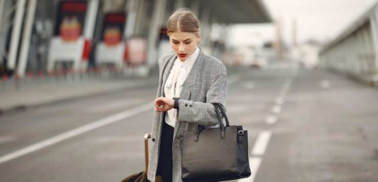 a woman looking at her watch