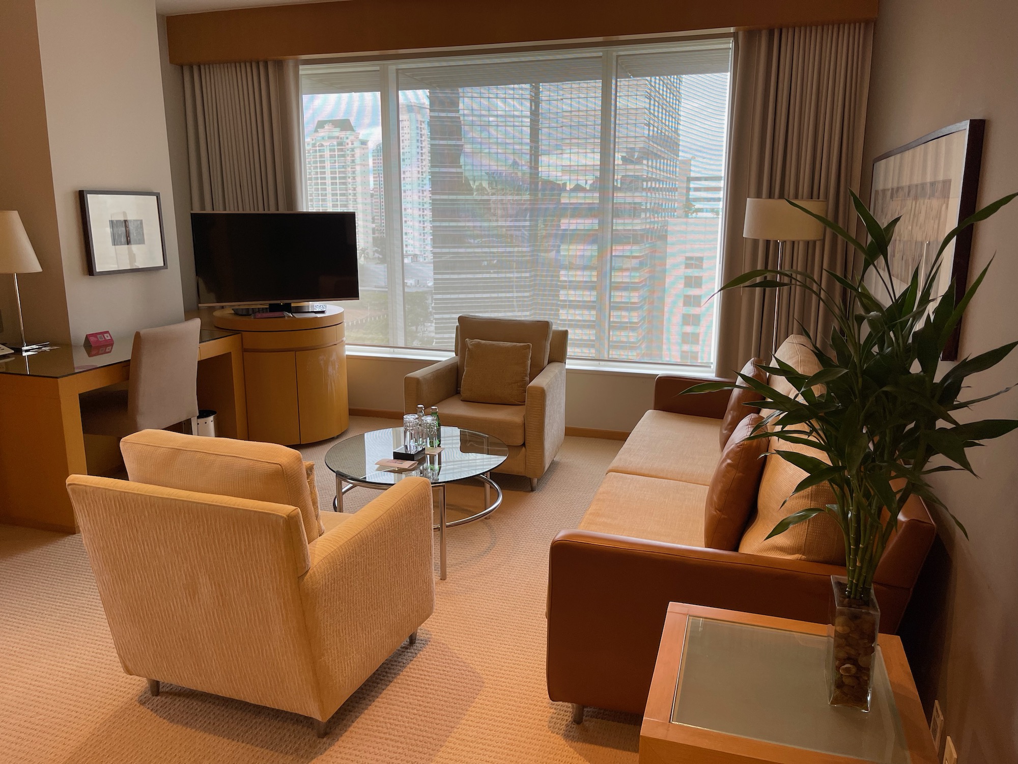 a living room with couches and a television