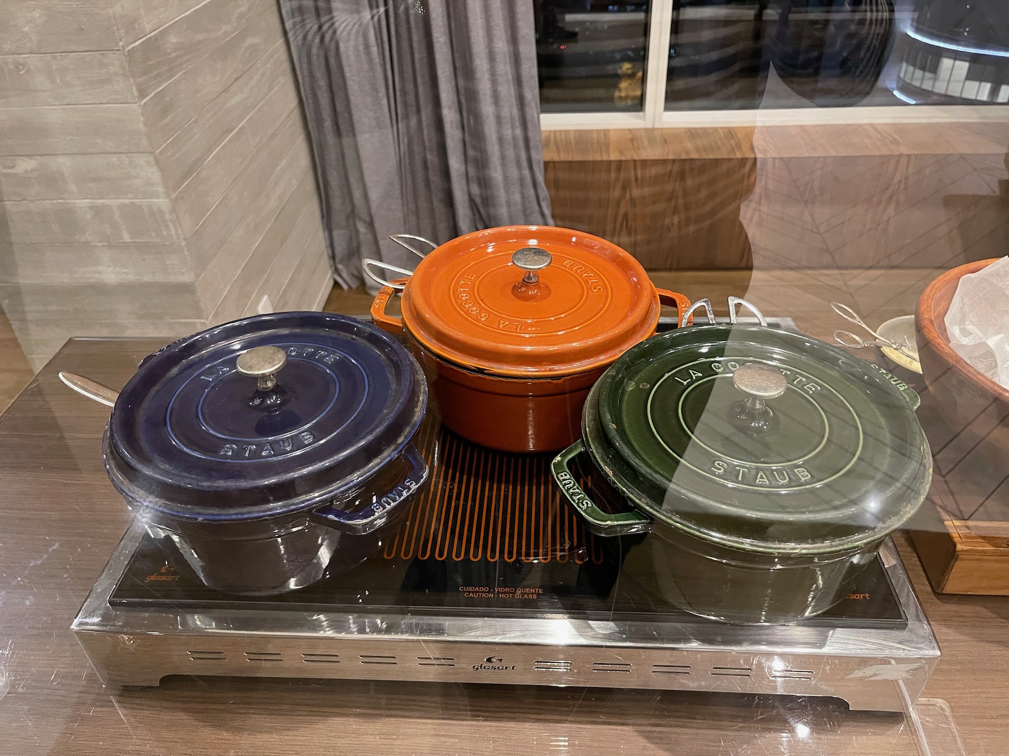 a group of pots on a counter
