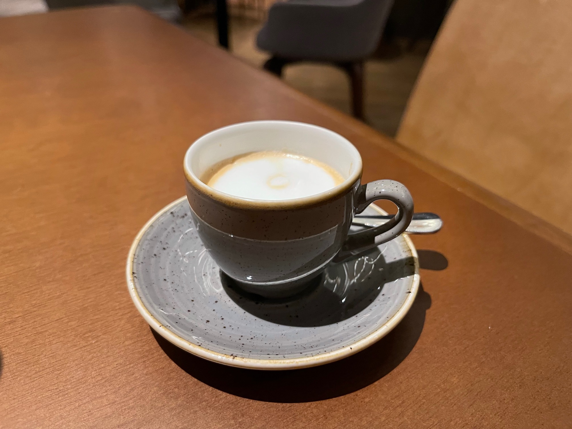 a cup of coffee on a saucer