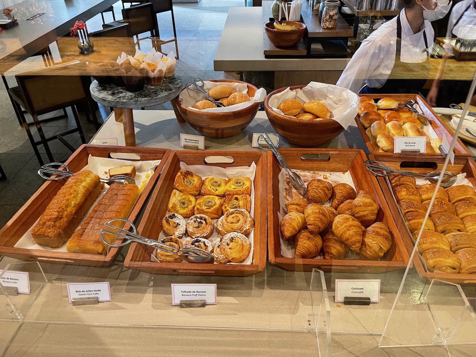 a group of breads in a display case