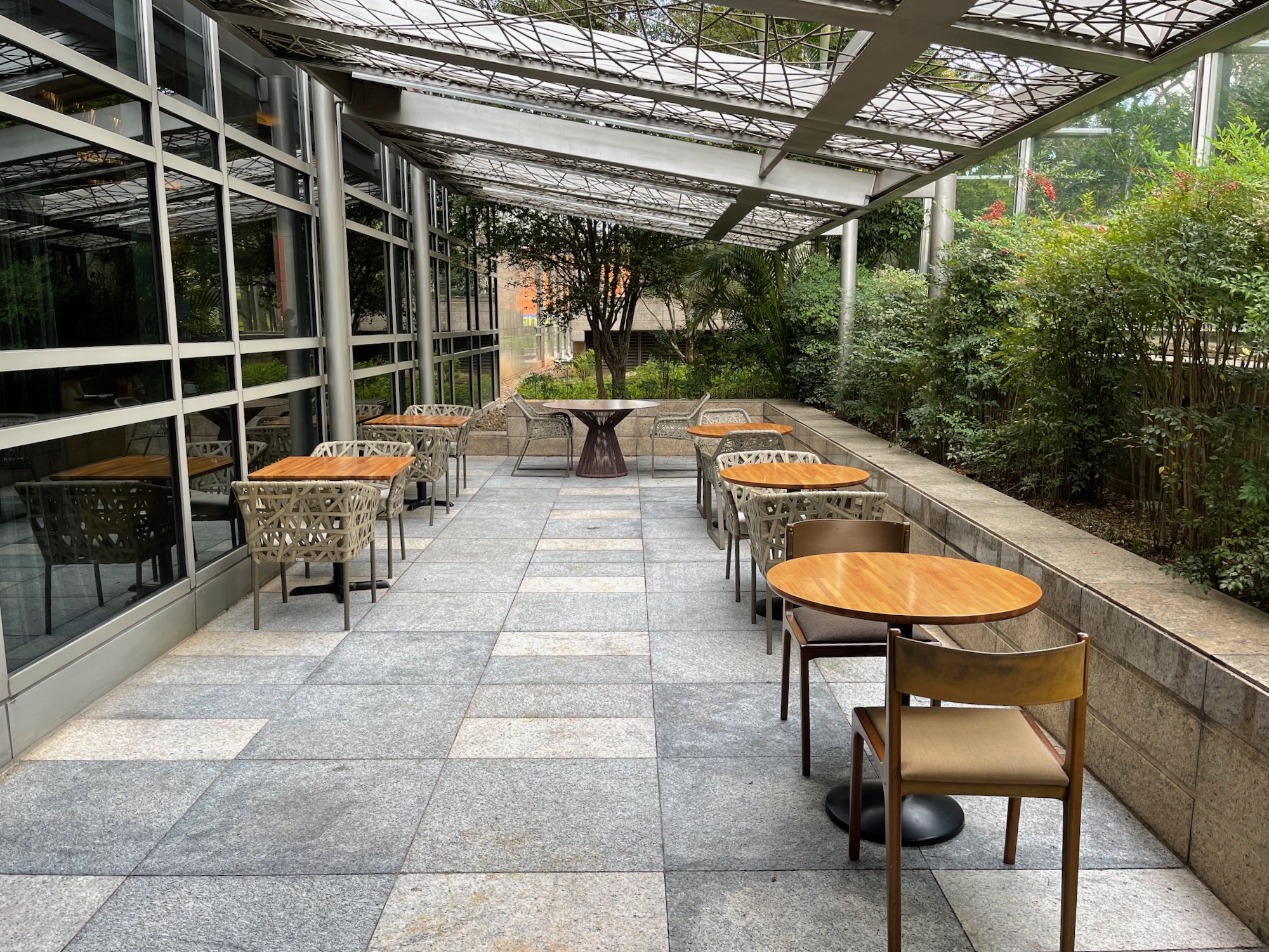 tables and chairs outside a building