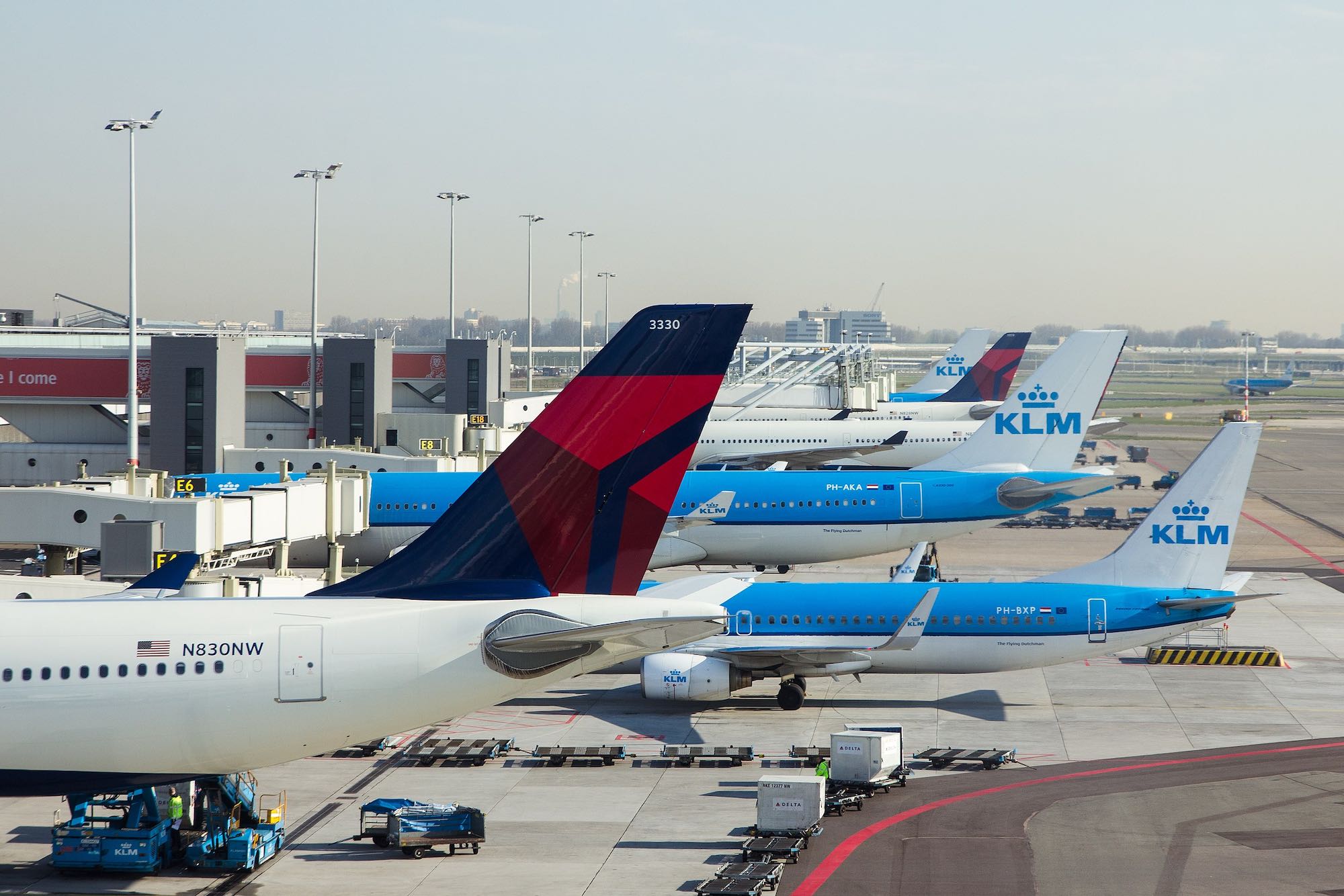 a group of airplanes at an airport