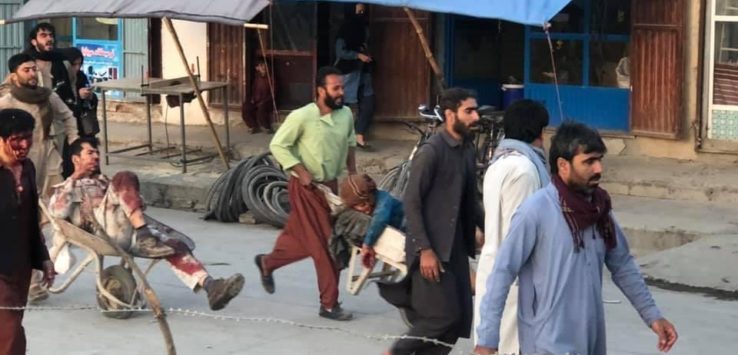 a group of people walking on a street