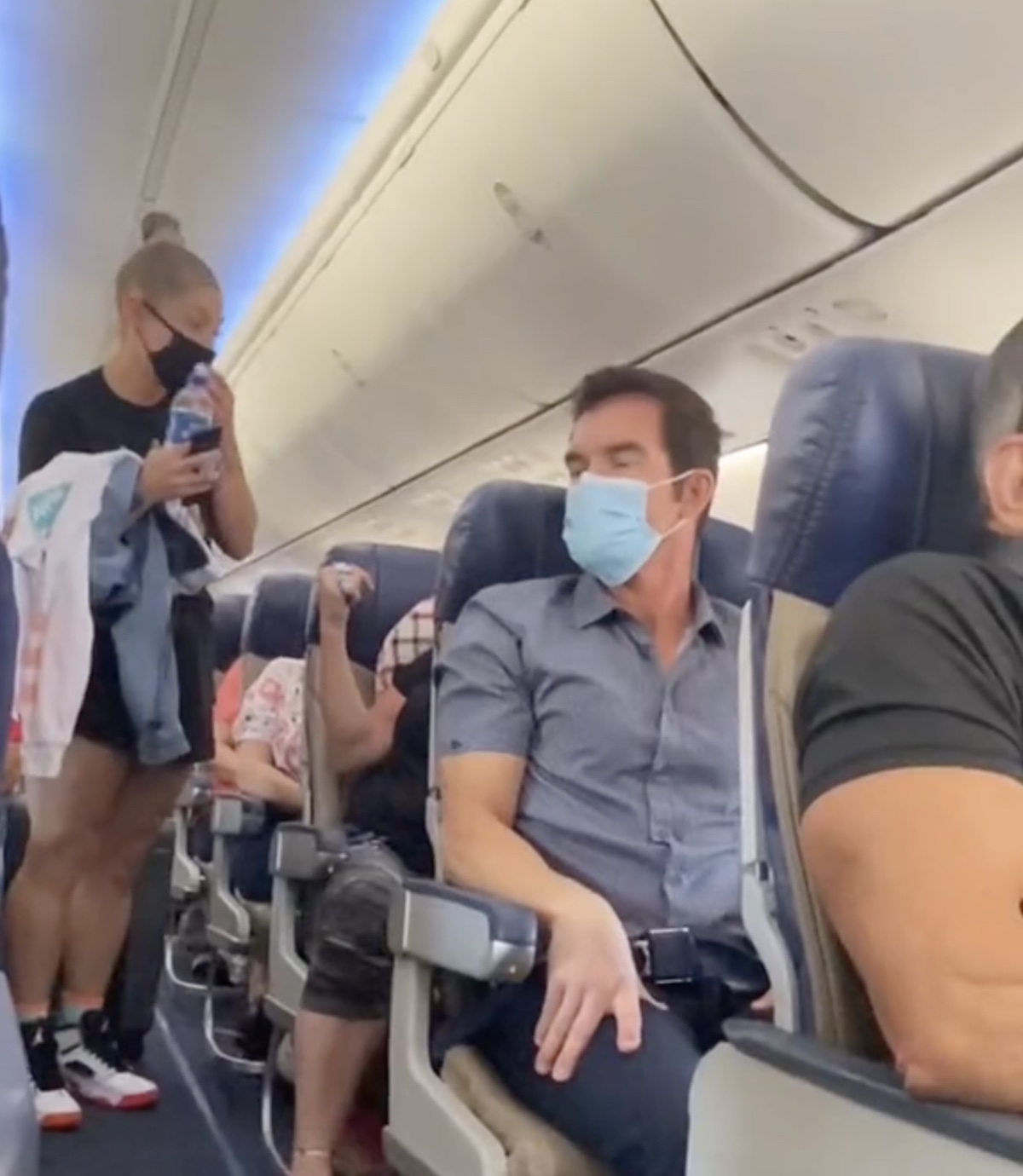 a group of people on an airplane