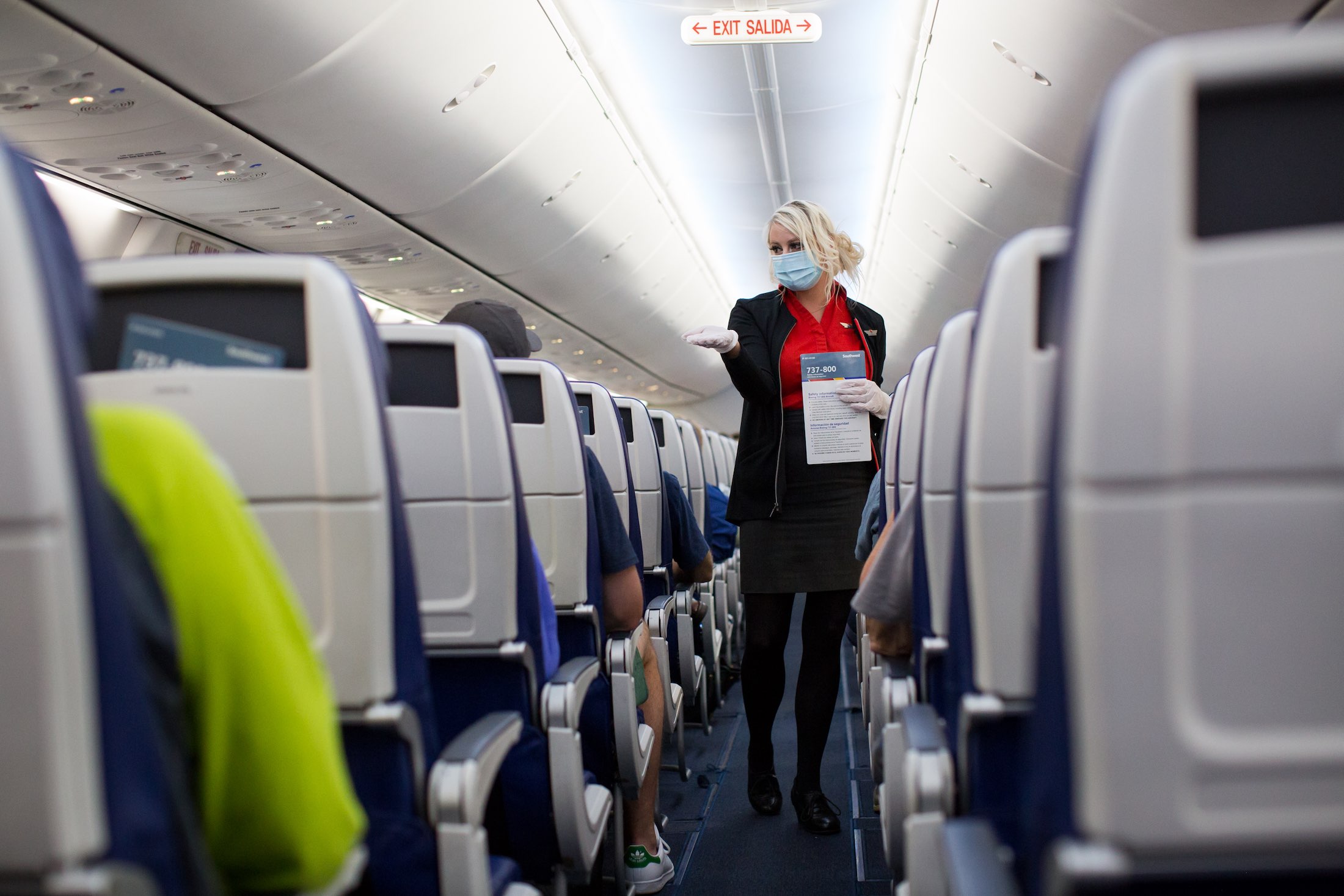 Flight attendants for Pacific Southwest Airlines showing off their