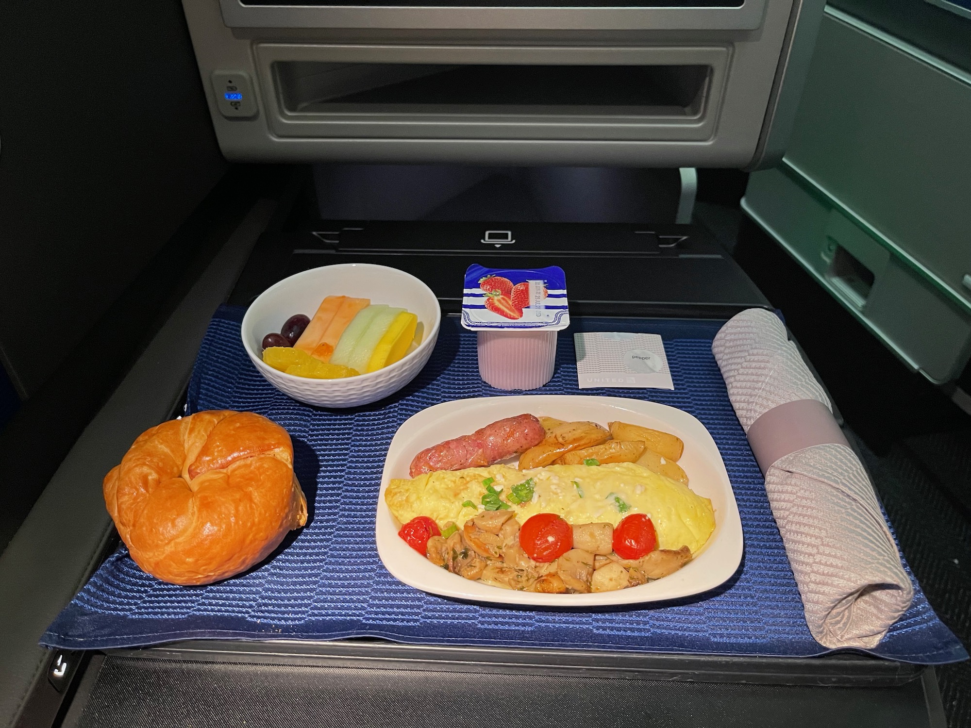 food on a tray in an airplane