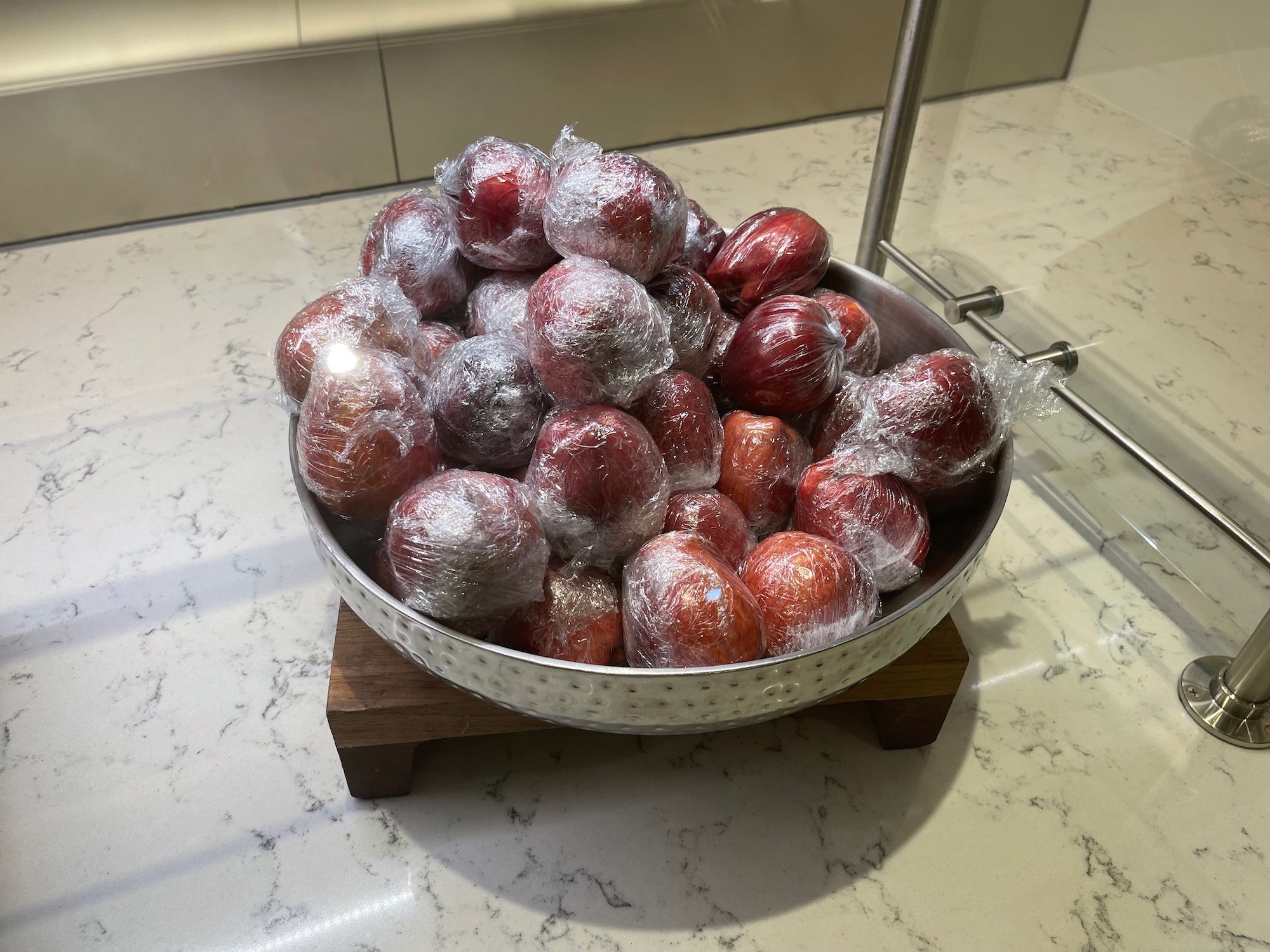 a bowl of food wrapped in plastic