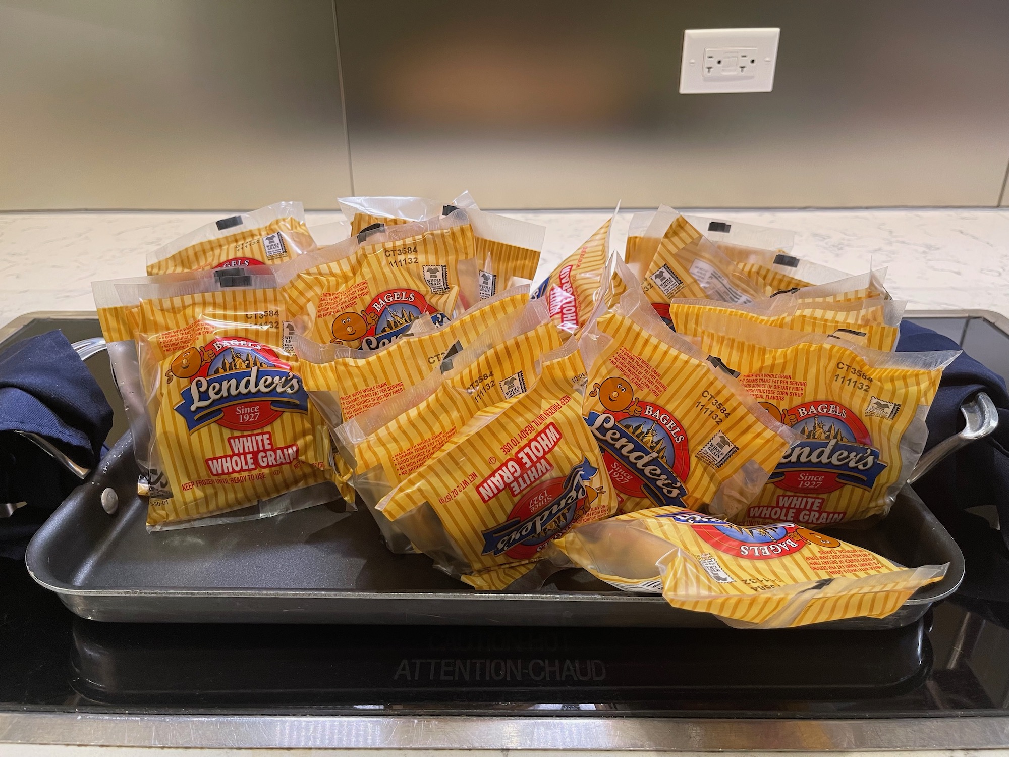 a group of packages of food on a metal tray