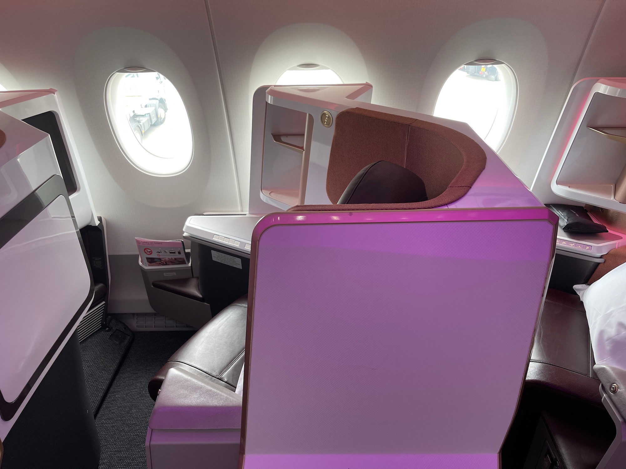 a purple and brown desk in a plane